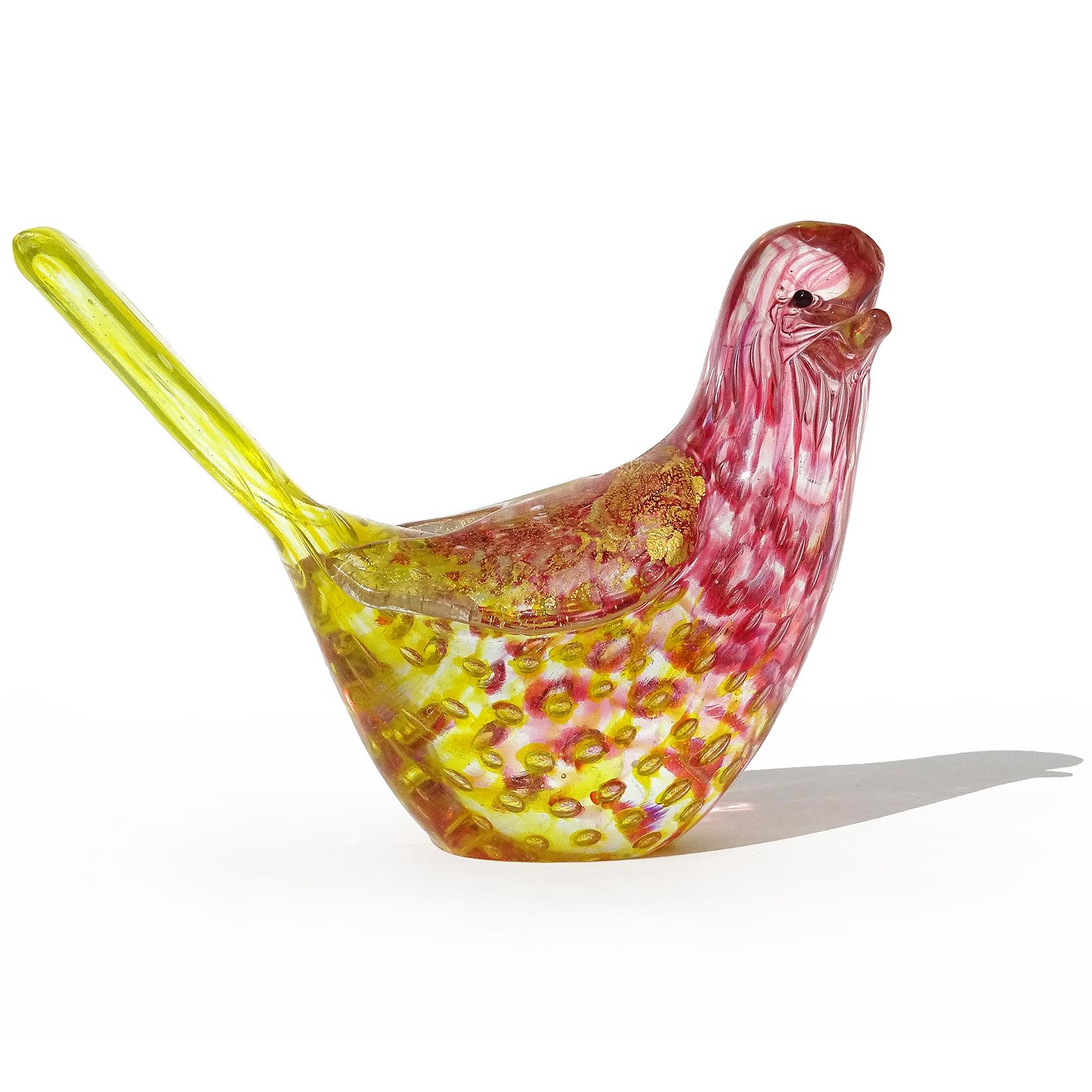 Beautiful vintage Murano hand blown yellow and pink spots, bubbles and gold flecks Italian art glass baby bird figurine / sculpture. Documented to the Barovier e Toso Company. The bird is made with the controlled bubble 