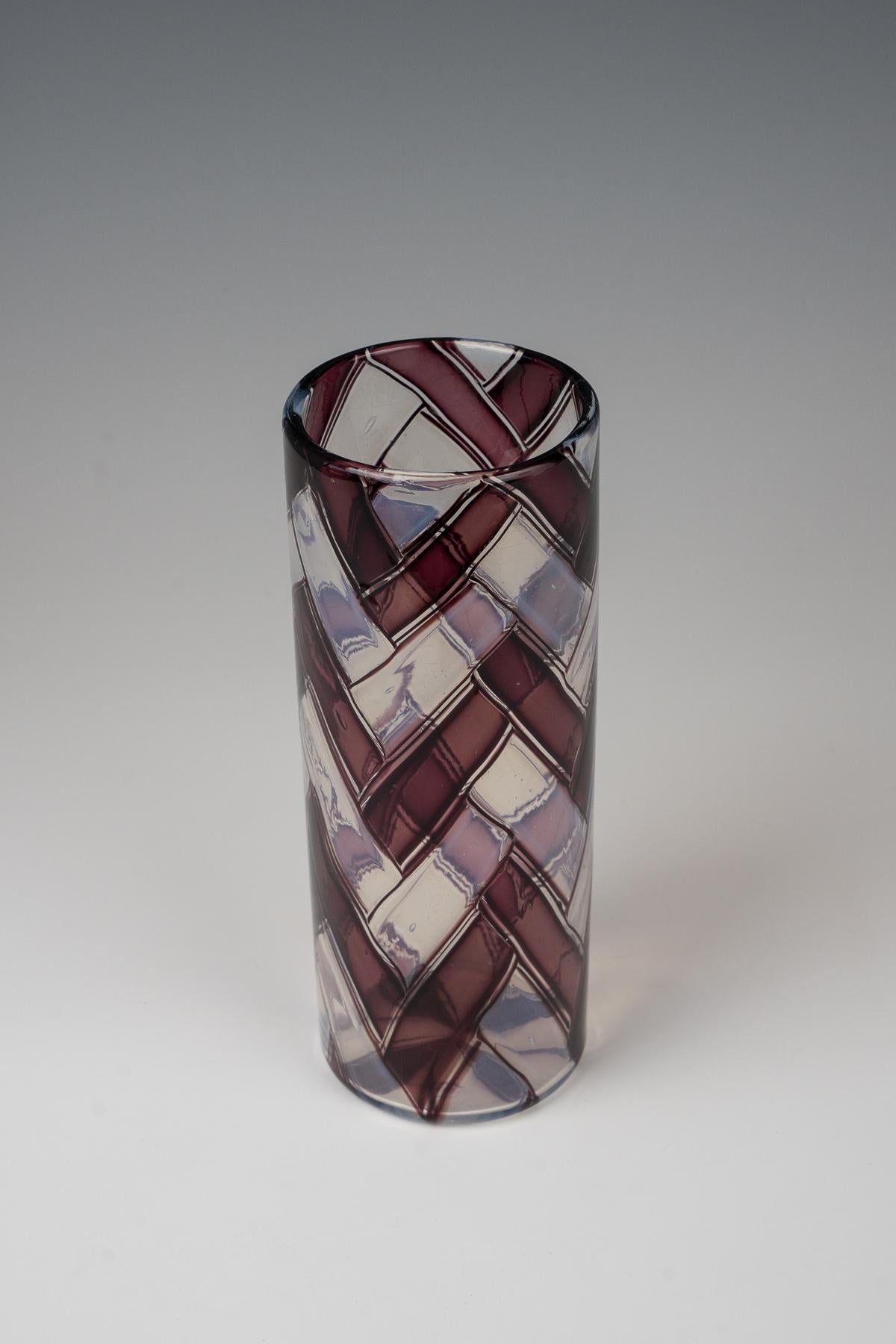 Barovier & Toso, signed vase 1961
edged glass tesserae
produced by Barovier & Toso, Murano, Italy
25 cm (height)
signed.
Cylindrical vase of the series 