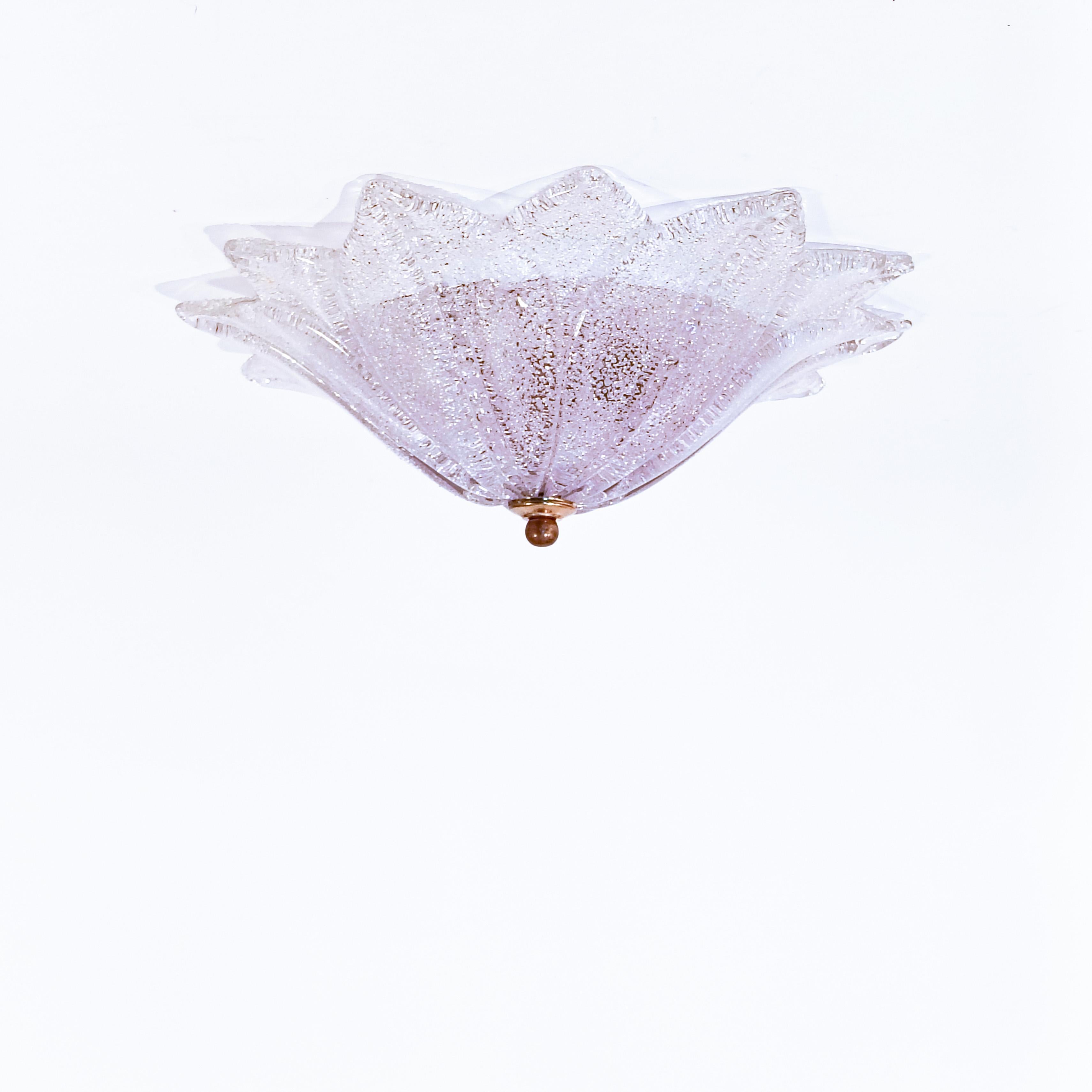 Murano glass flush mount by Barovier&Toso, Italy, 1980s. Handmade textured Murano glass diffuser in the shape of vegetable leaves, and attached to a white lacquered metal structure with brass details. Frosted style glass on the inside.
Very much in