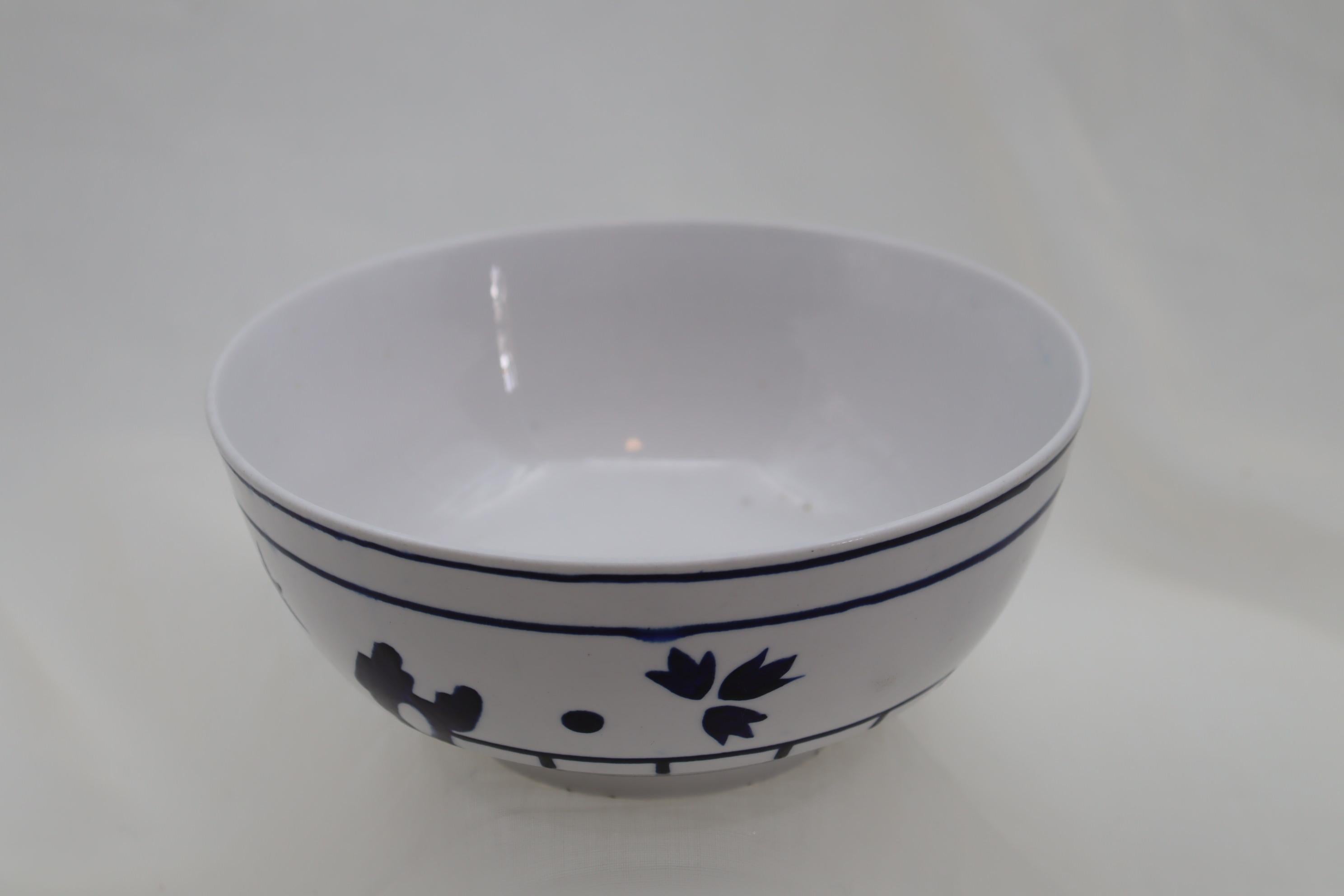 This is an interesting survivor. A Barr, Flight and Barr porcelain bowl that is painted in underglaze blue as the base for the 