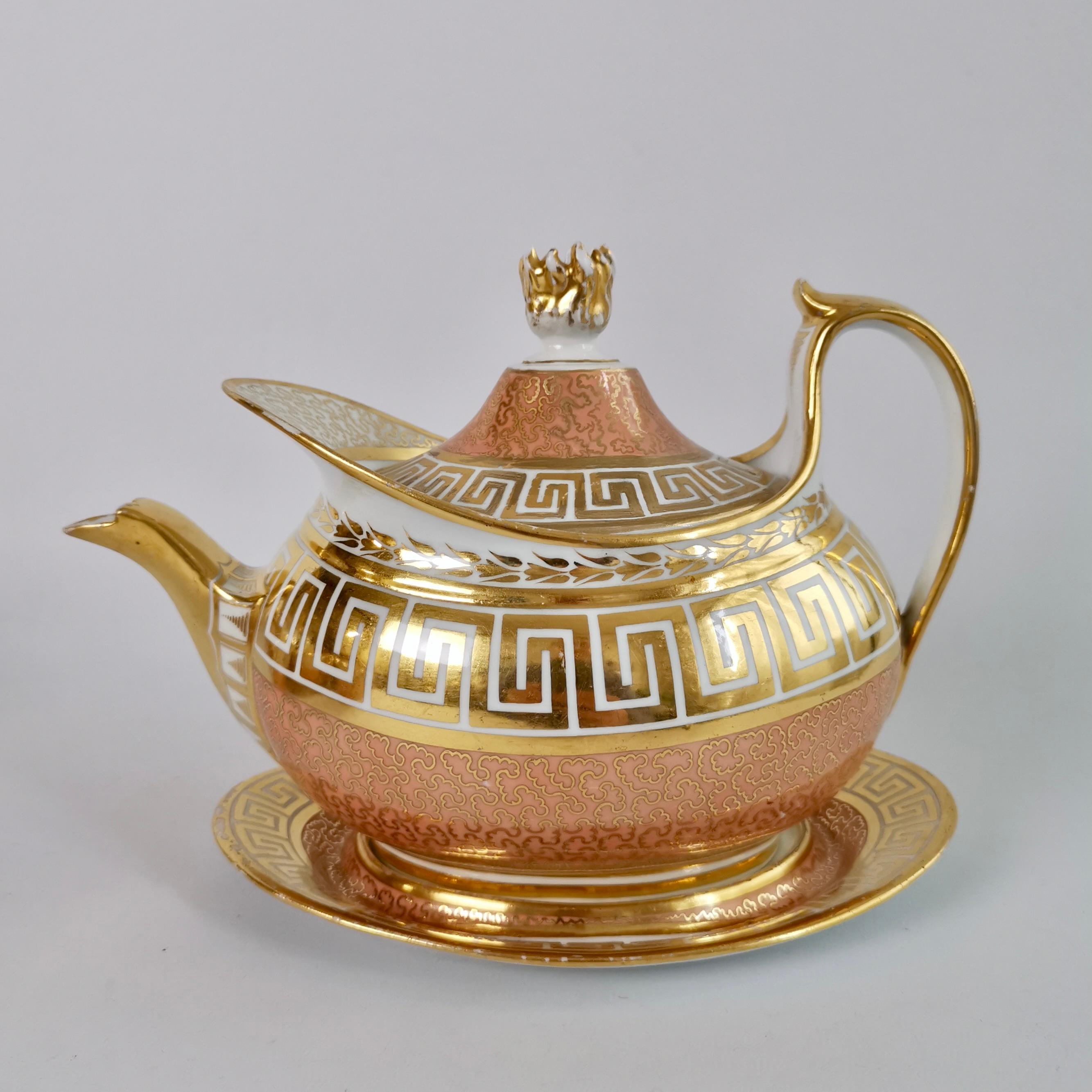 This is a spectacular tea service made by Barr, Flight & Barr around the year 1804. The service has the characteristic deep peach with gilt vermicelli ground, and bands of lavishly gilded Greek keys in the neo-classical style. The service consists