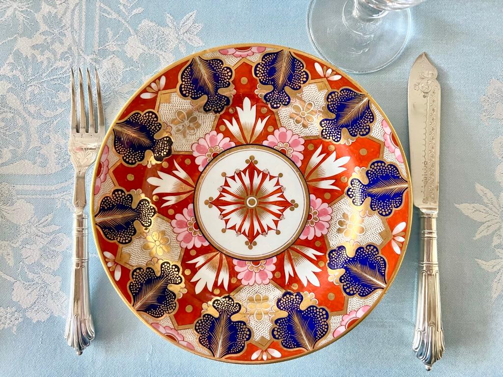 This is a beautiful set of four plates made by Barr Flight & Barr in Worcester, and painted with a bold 