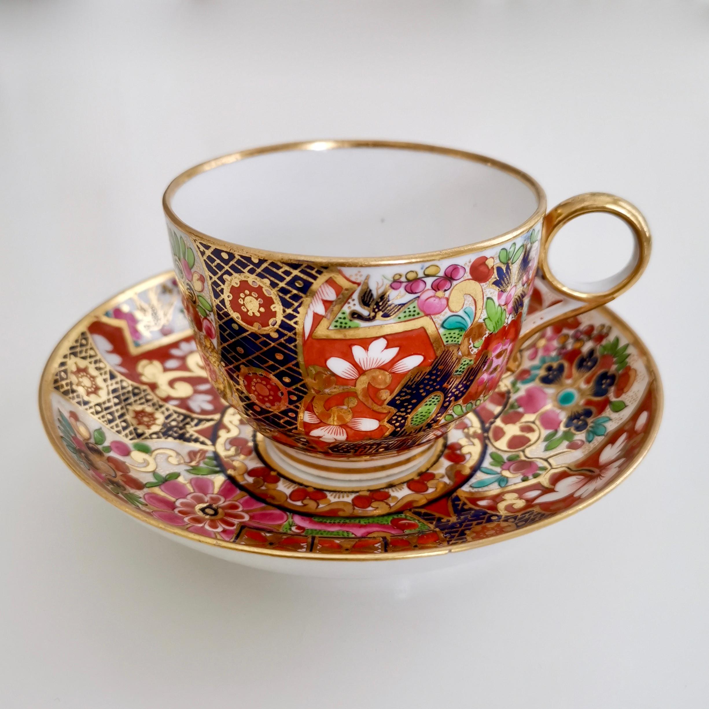 This is a spectacular teacup and saucer made by Barr Flight & Barr between 1811 and 1813. It is made in the bute shape and has what is often called the 