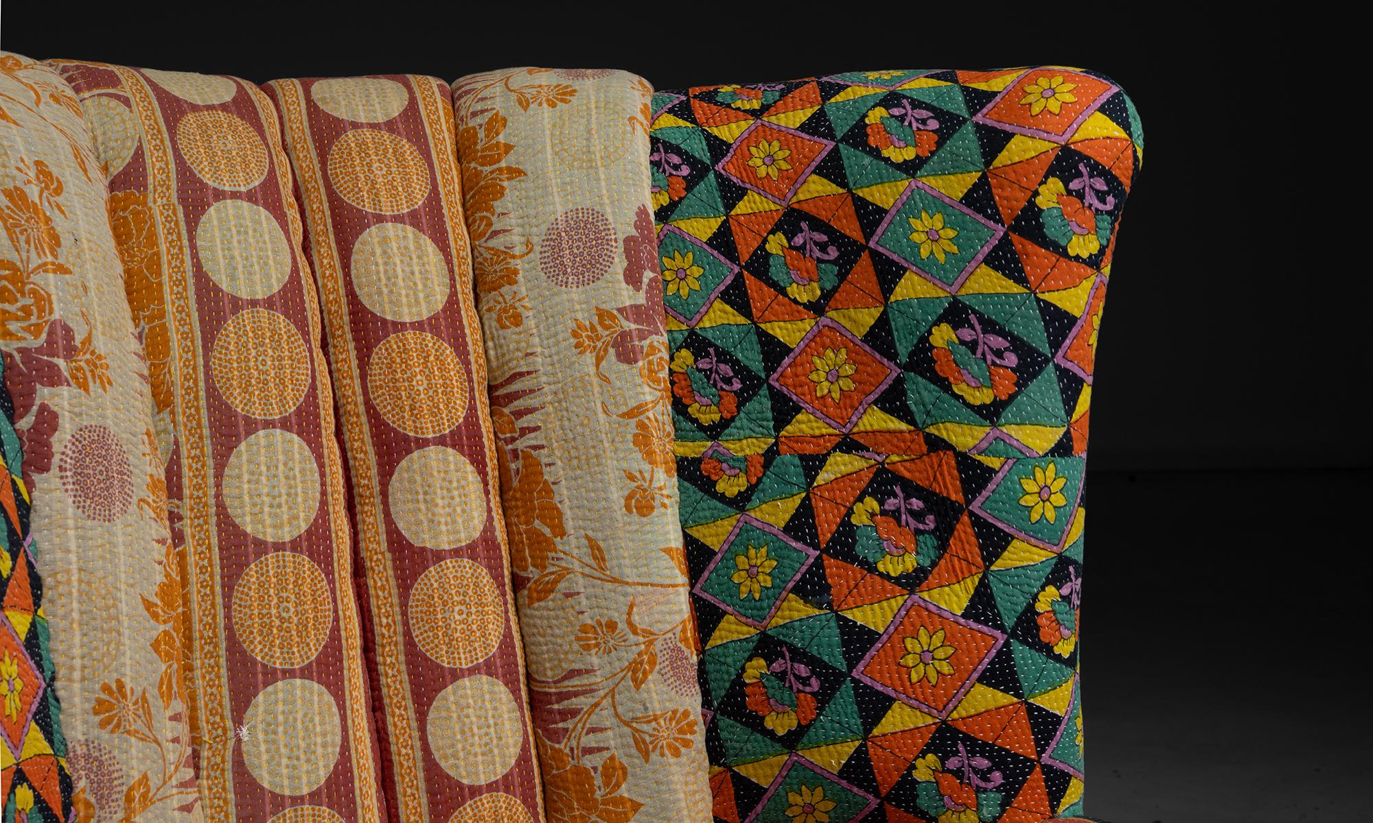 English Barrel Back Armchair in Indian Quilts, England circa 1920 For Sale