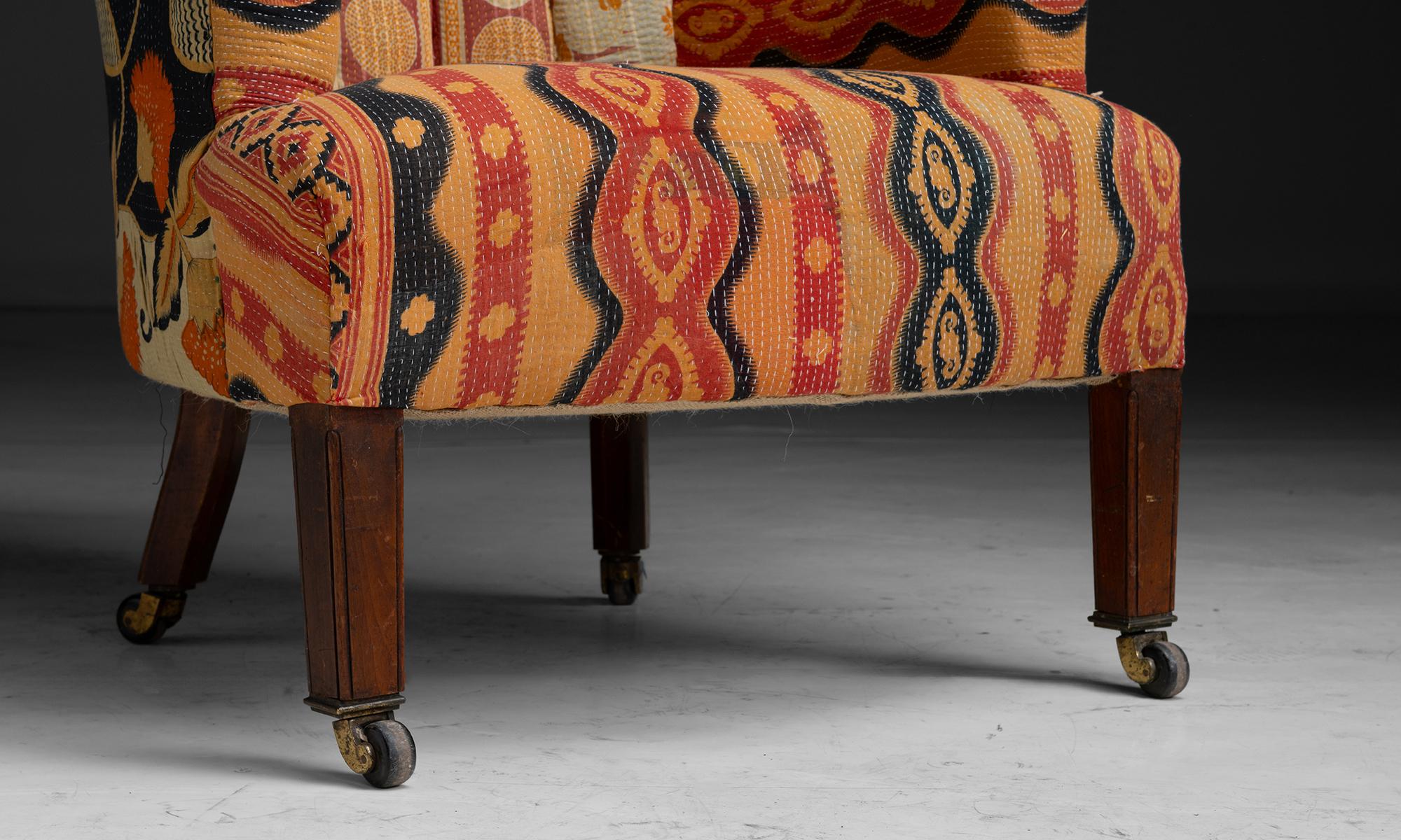 Mahogany Barrel Back Armchair in Indian Quilts, England circa 1920 For Sale