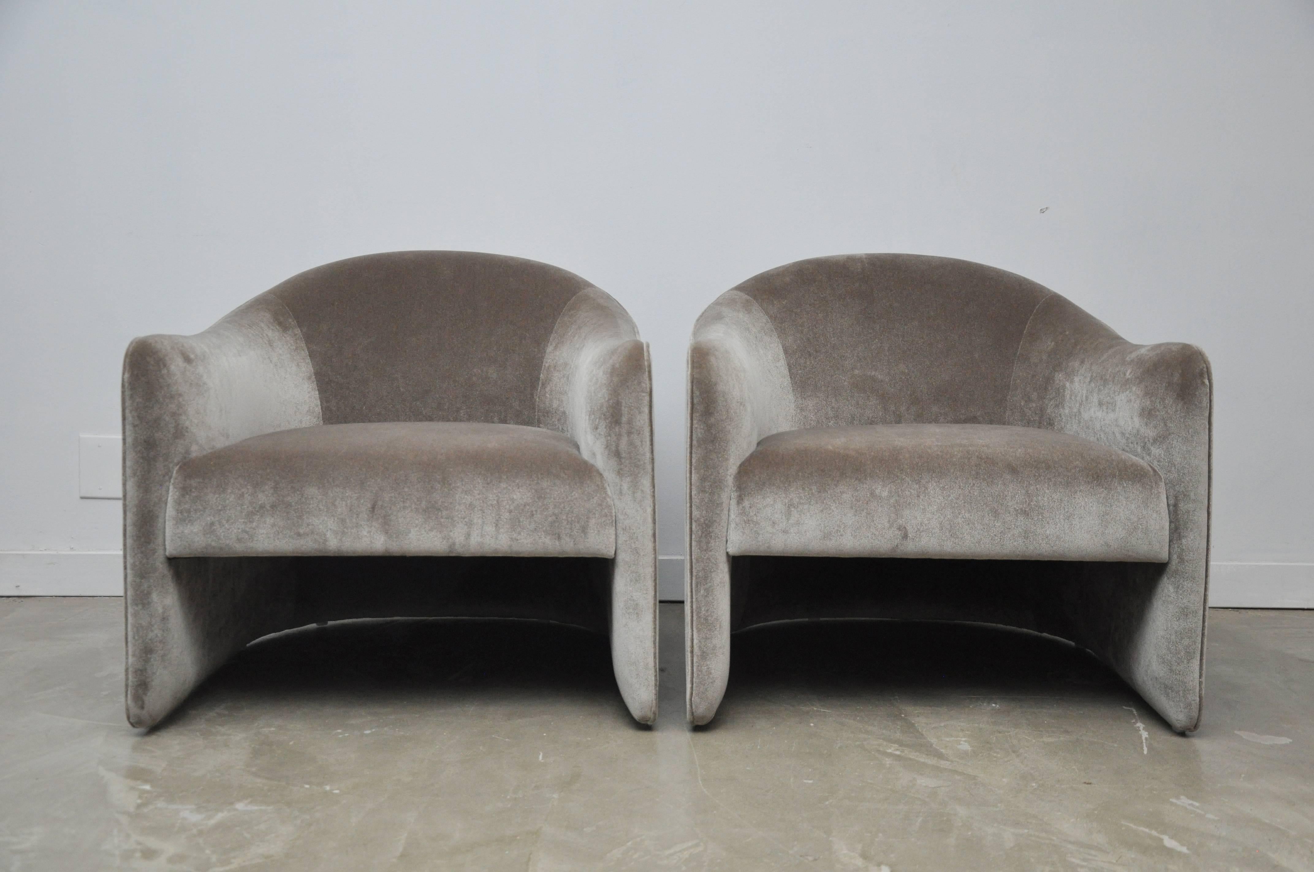 Barrel back lounge chairs, circa 1970. Fully restored with all new foam and low pile velvet upholstery.