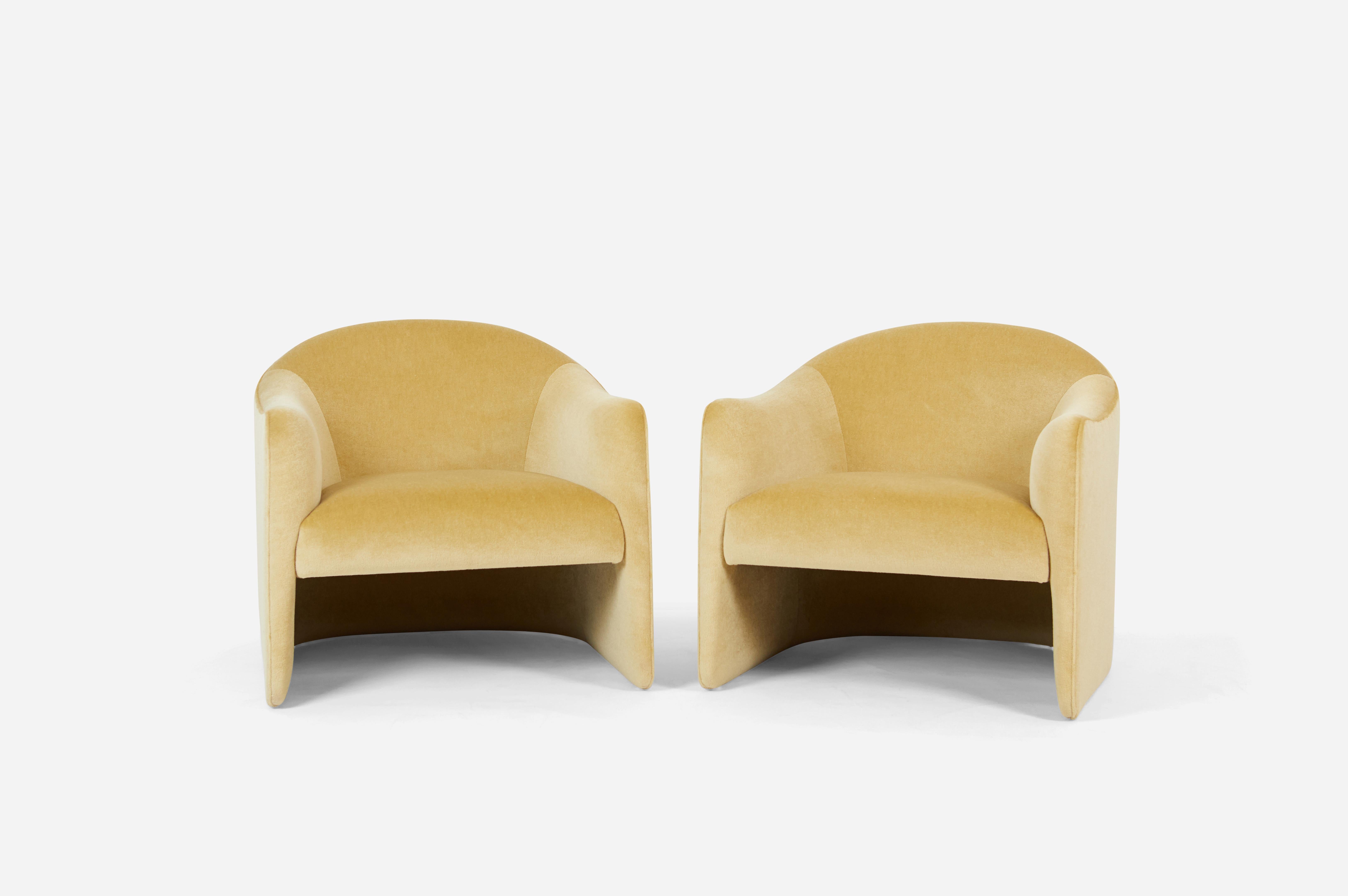Barrel back lounge chairs, circa 1970. Fully restored with all new foam and striking gold mohair.