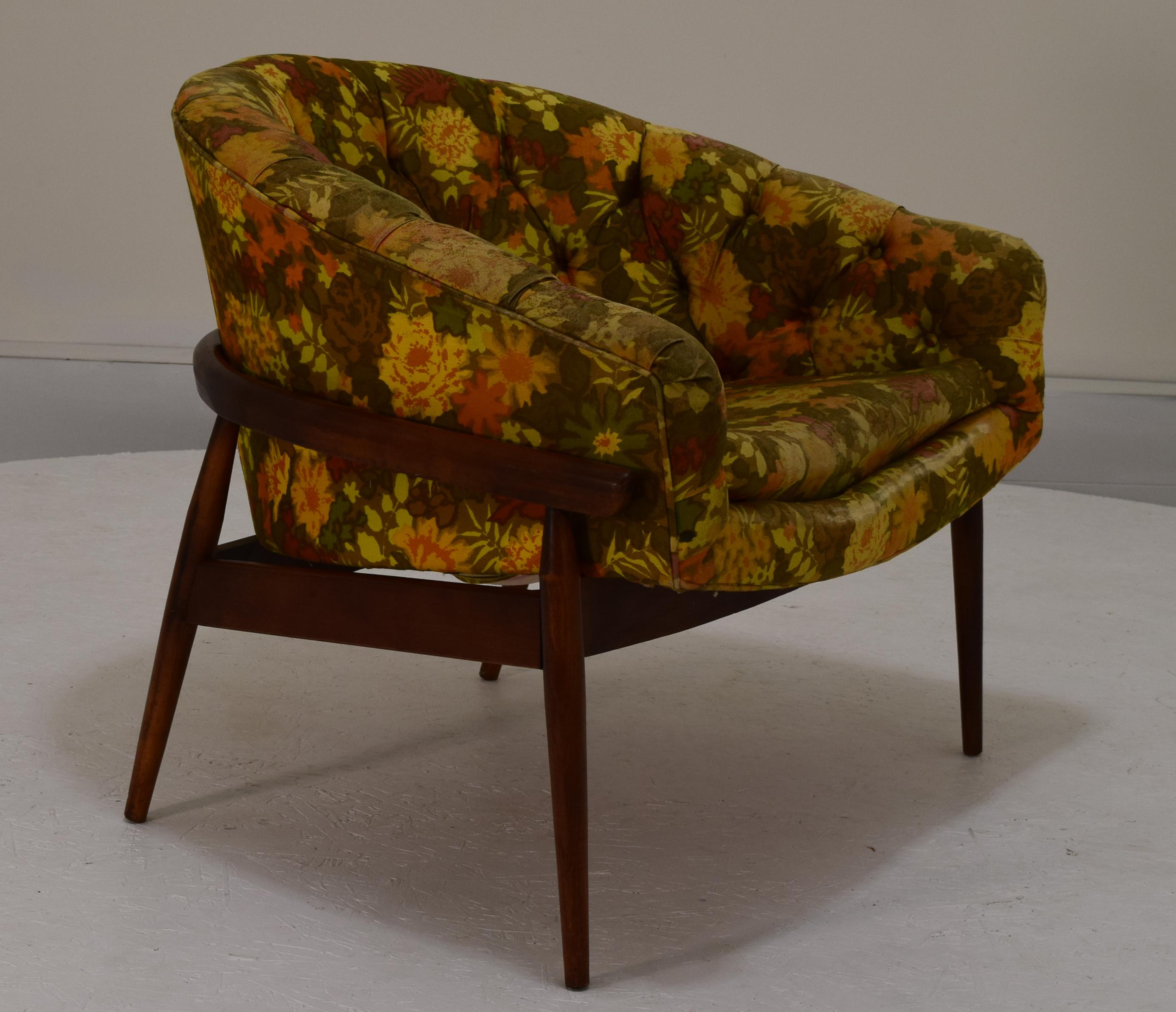 This chair model has been attributed to various designers from Lawrence Peabody to Milo Baughman, but none of these attributions have been confirmed. It is a beautiful chair that will require new strapping to the seat and as well reupholstering. It