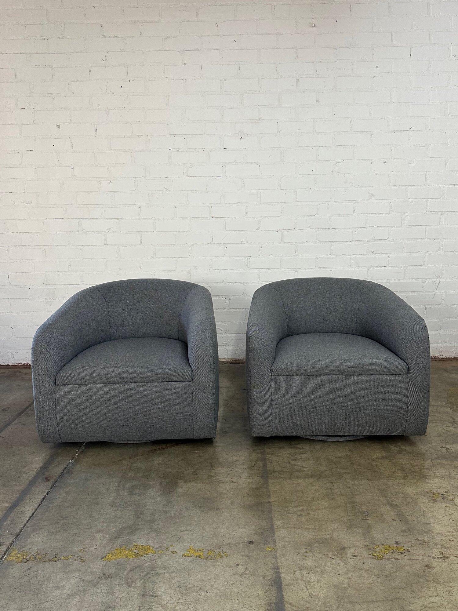 W32.5 D34 H29 SW23 SD23 SH16 AH22

Contemporary barrel chairs that were custom made and used for staging. Chairs are structurally sound and fully functional with no major areas of wear. Both items offer ample depth and swivel. Price is per lounge