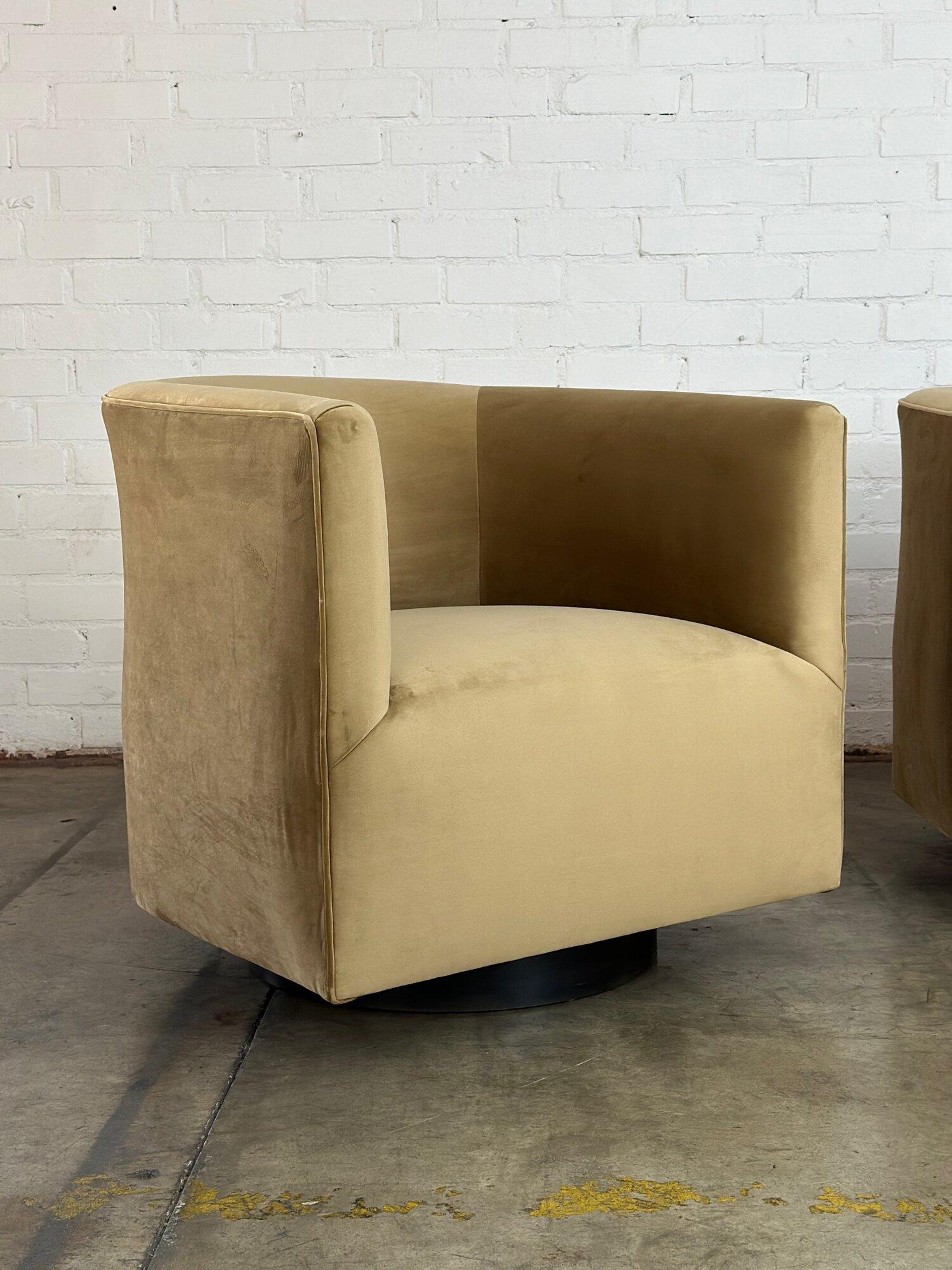 W33 D36 H31.5 SW23 SD23 SH18 AH30

Newly upholstered barrel swivel chairs on metal plinth bases. Metal swivel bases have a patinated bronze look and are in great condition with no visible large areas of wear. Each lounge chair is fully functional