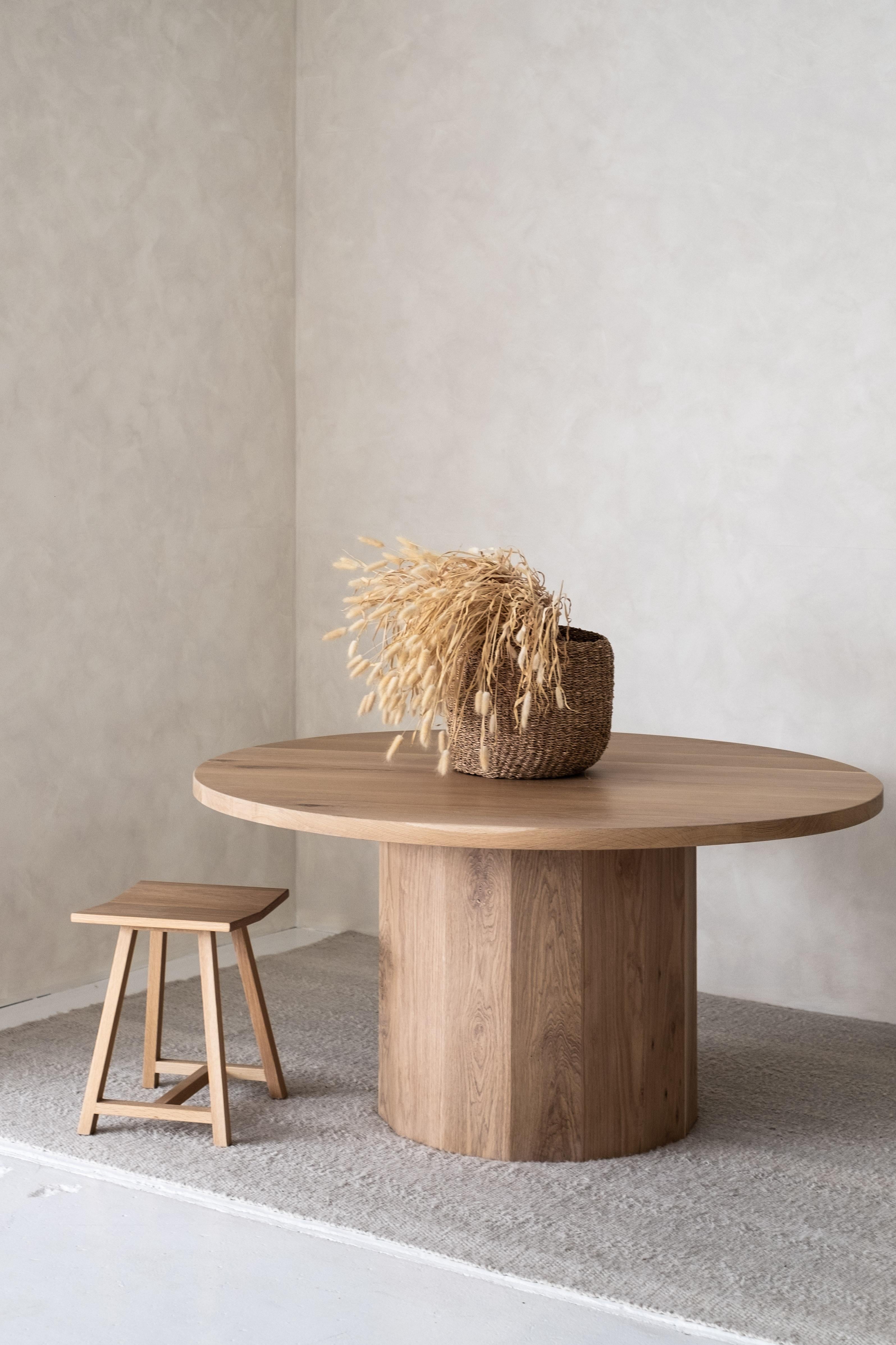 Inspired by the cellar, this round dining table brings warm sophistication to any home or office space. A timber masterpiece, the Barrel Table features a 40mm thick oak top and precisely joined circular base, a Classic yet contemporary piece equally