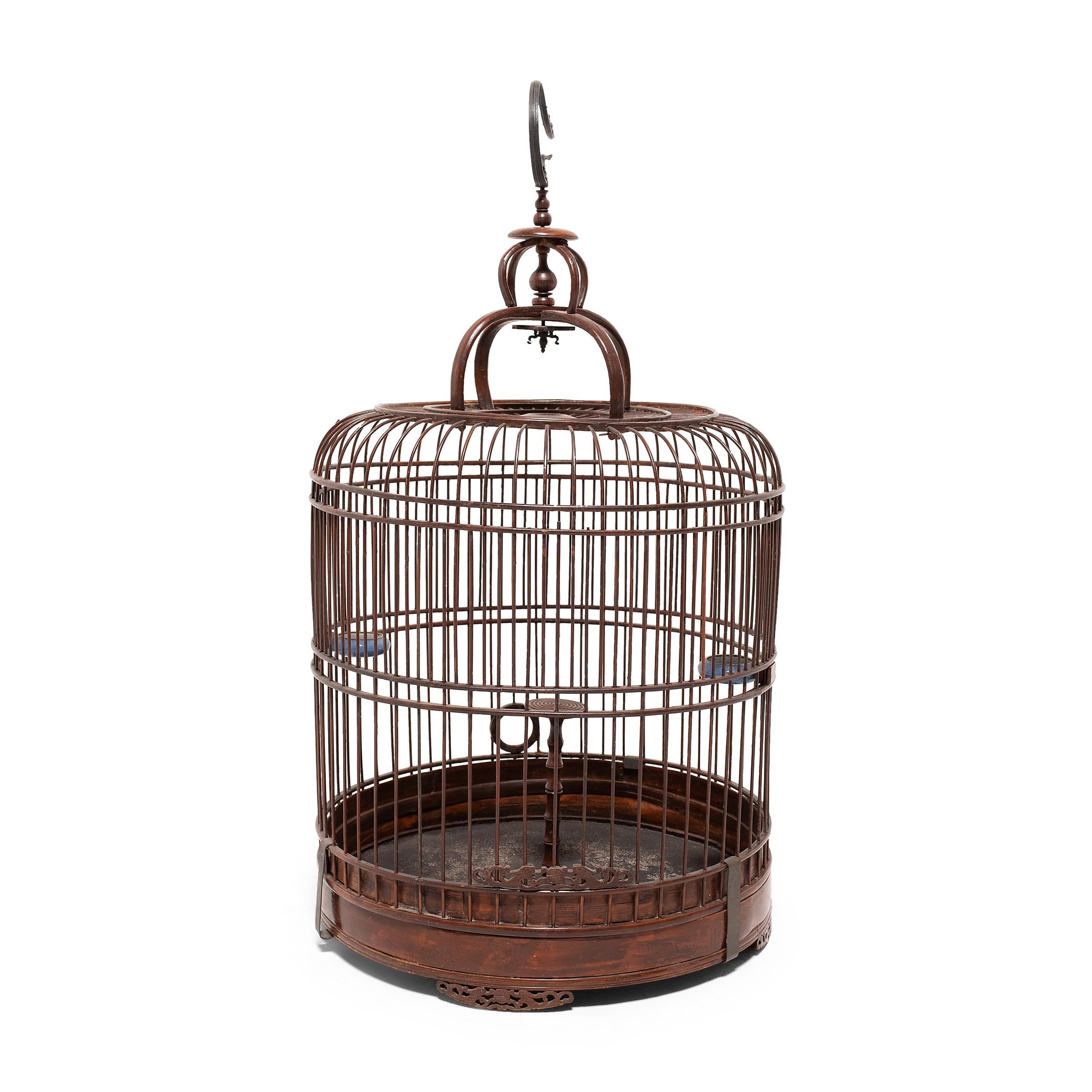 This barrel-form birdcage dates to the late 19th century and was once home to a petite ornamental songbird. Bird-keeping was a popular pastime throughout the Qing dynasty and inspired its own material culture of beautiful cages and fine