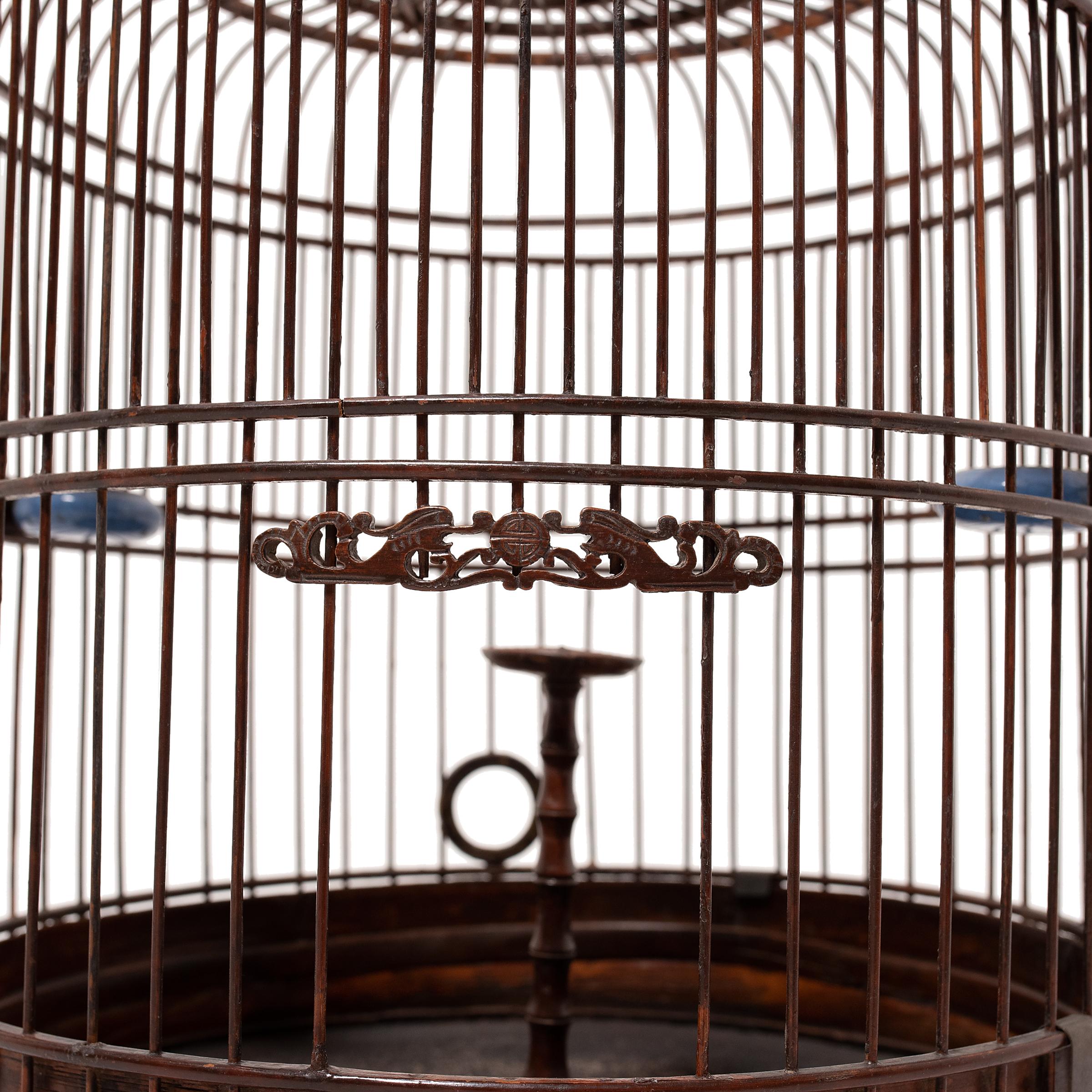 Qing Barrel-Form Chinese Birdcage with Blue Glazed Waterpots, circa 1900