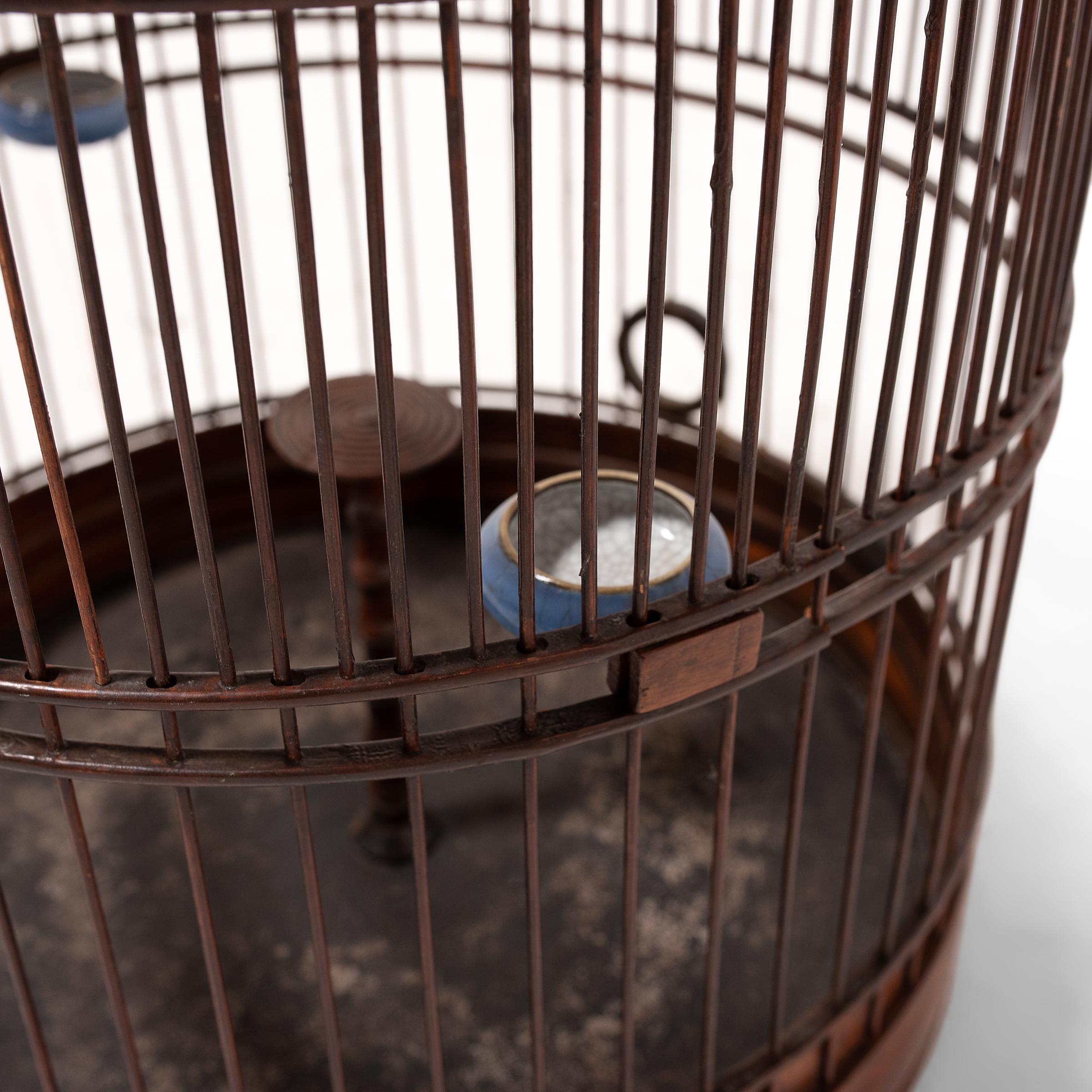 Barrel-Form Chinese Birdcage with Blue Glazed Waterpots, circa 1900 In Good Condition In Chicago, IL