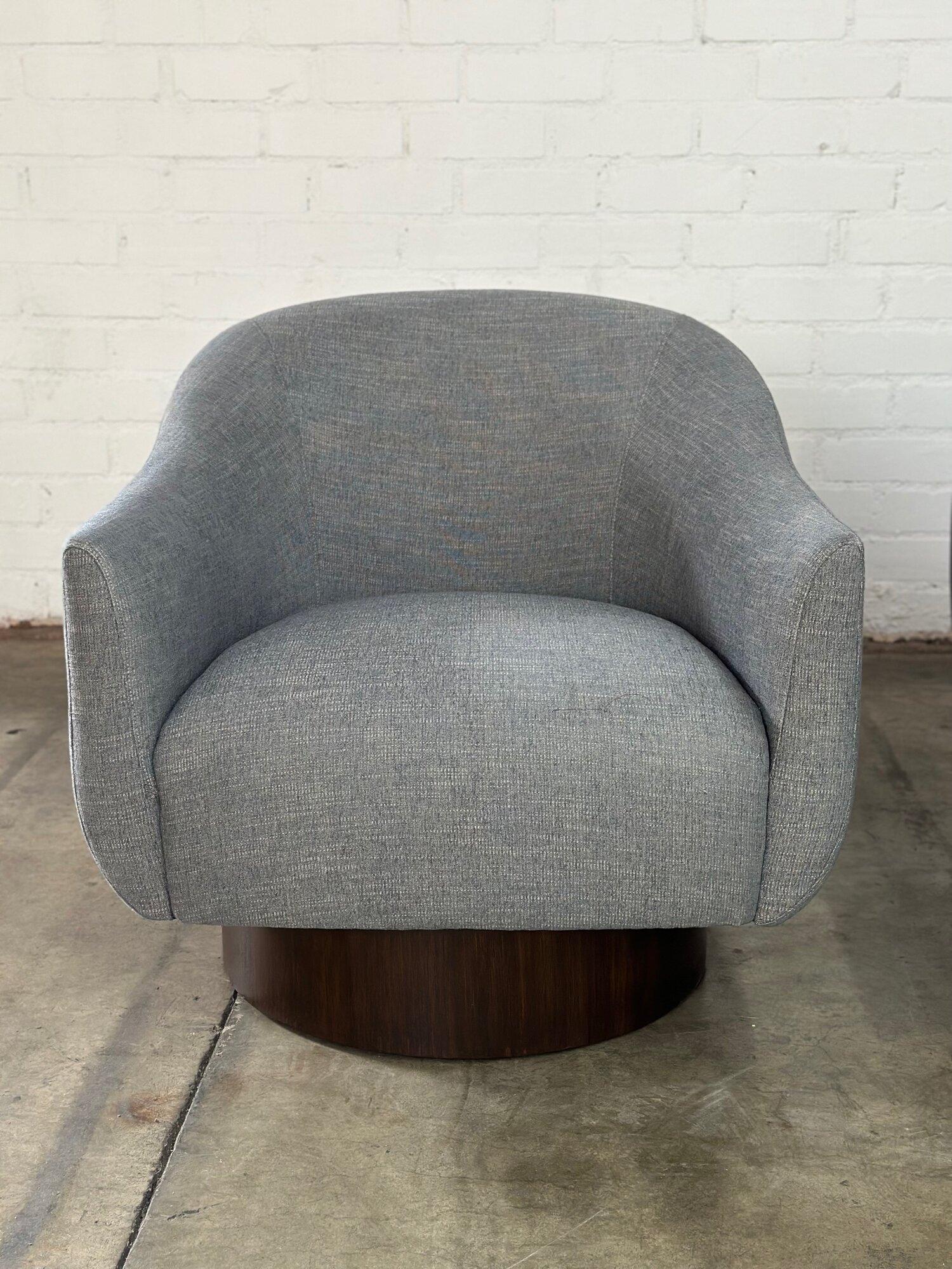 W31.5 D33 H30.5 SW22 SD22 SH15 AH23

Barrel Lounge Chairs with a walnut finished plinth base. Item has brand new Grayish Blue upholstery, in the color Fog. Both chairs are structurally sound and sturdy.

Price is for the pair *

circa 2000’s