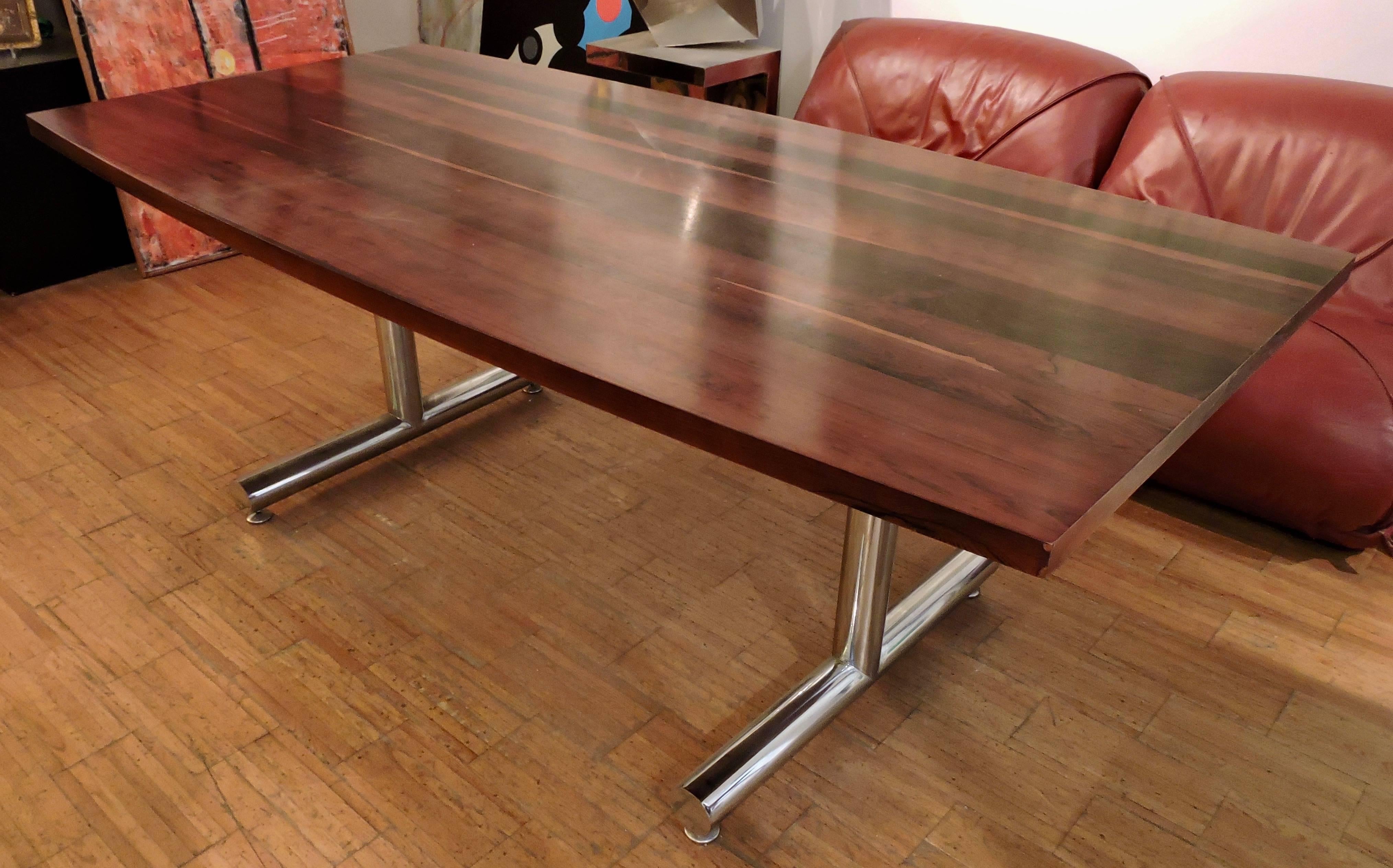 Barrel shaped hardwood and chromed metal conference dining table, 1970s.