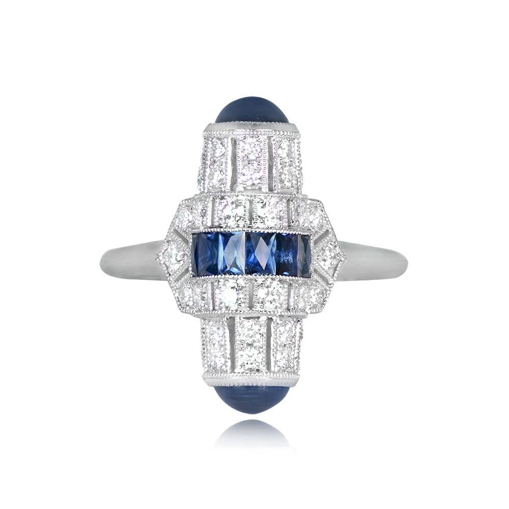 This Art Deco-style ring showcases French cut sapphires channel-set horizontally and bordered by rows of round brilliant cut diamonds. The diamonds adorn both the top and bottom of the sapphires and extend onto the shoulders. Additional vertical