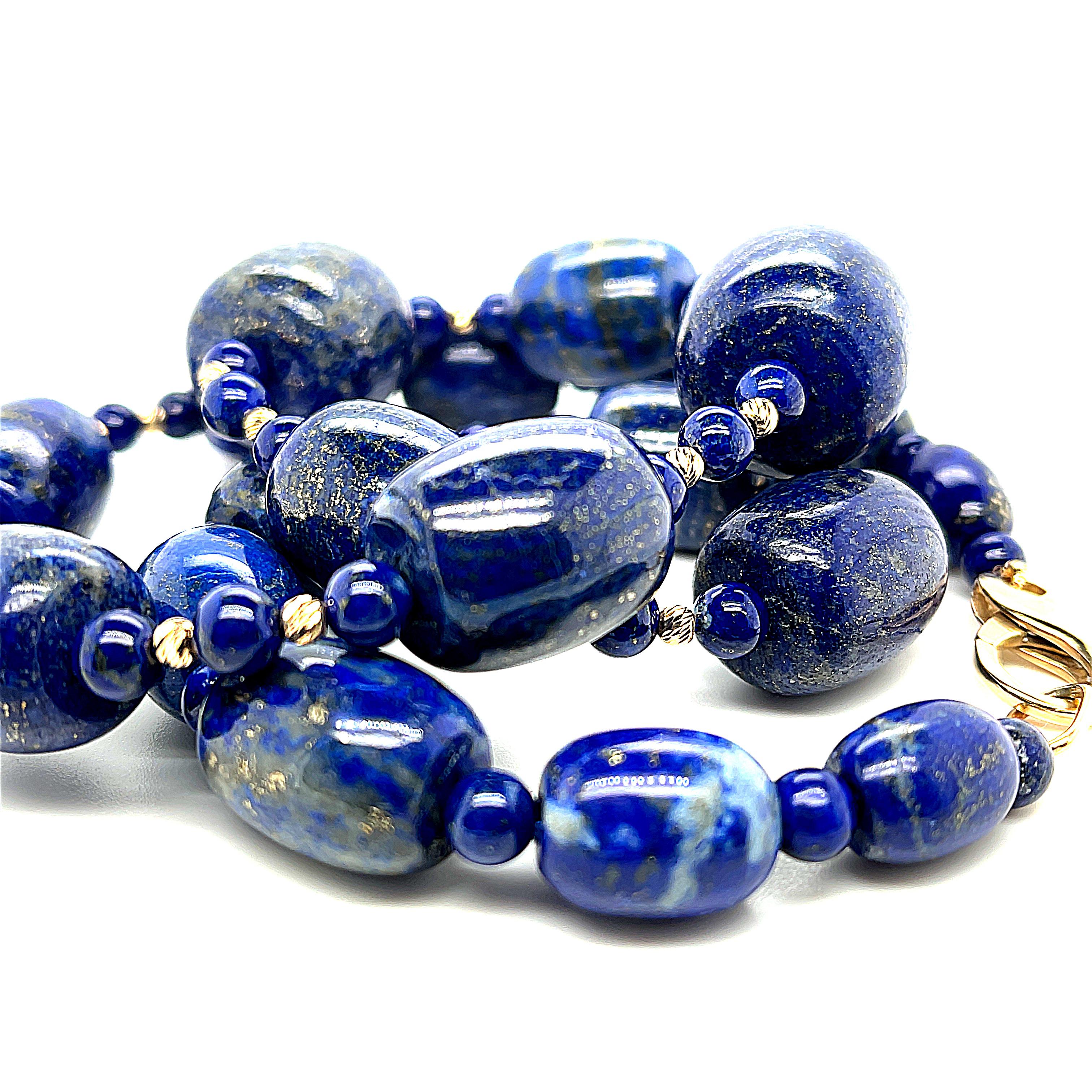 Artisan Barrel Shaped Lapis Lazuli Beaded Necklace with Yellow Gold Accents, 24 Inches For Sale