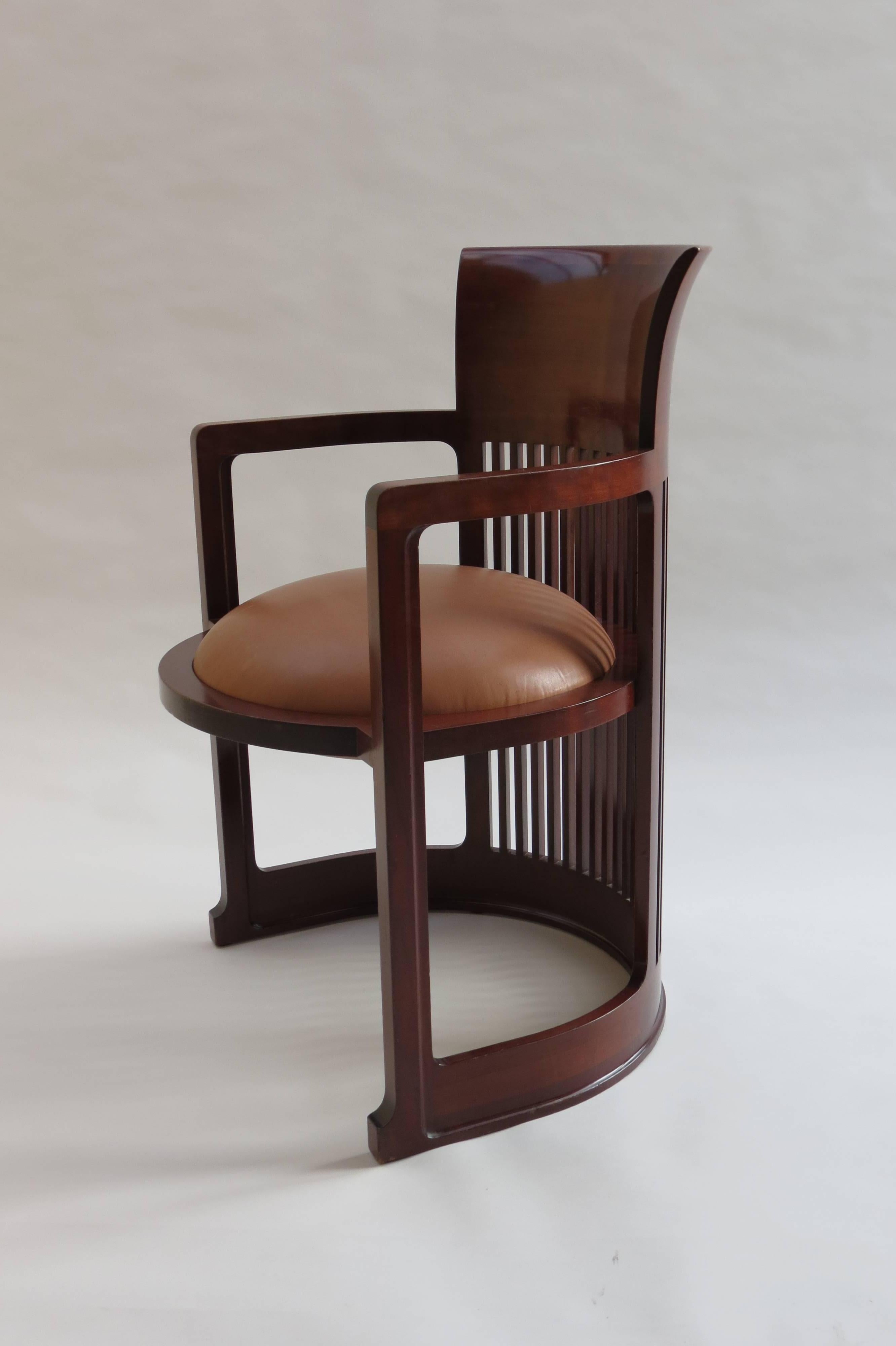 Taliesin Barrel chair is designed by Frank Lloyd Wright and produced by Cassina.
Made from solid cherrywood, newly covered ball cushion in  leather.

Stamped to underside Frank Lloyd Wright Cassina 4167 1986.
  