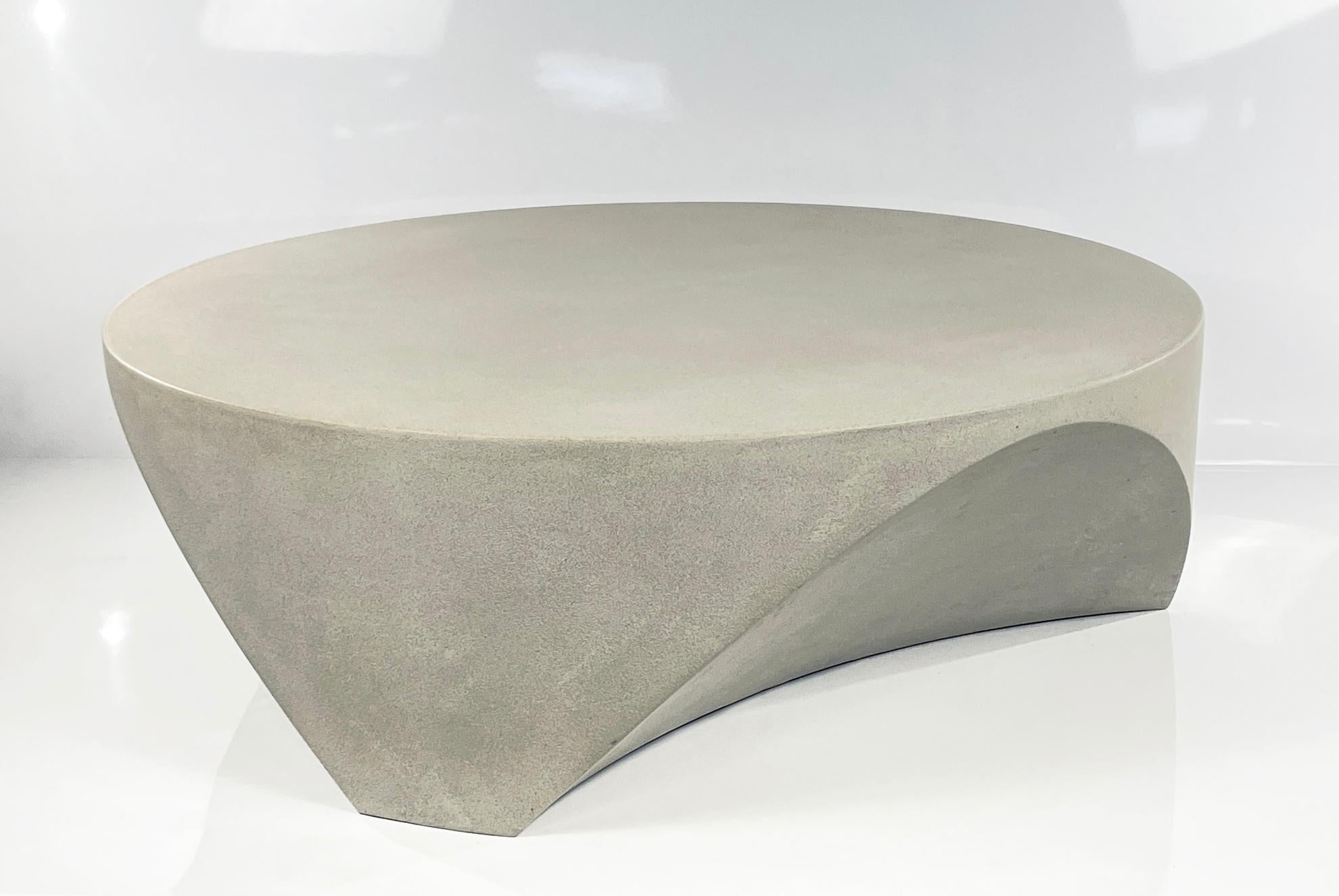 William Earle's barrens cocktail table in cast concrete/resin mix.
has the look of concrete with half of the weight.
also pictured, the barrens concrete side table / stool, as well as the barrens in italian walnut,
'charred' walnut and
