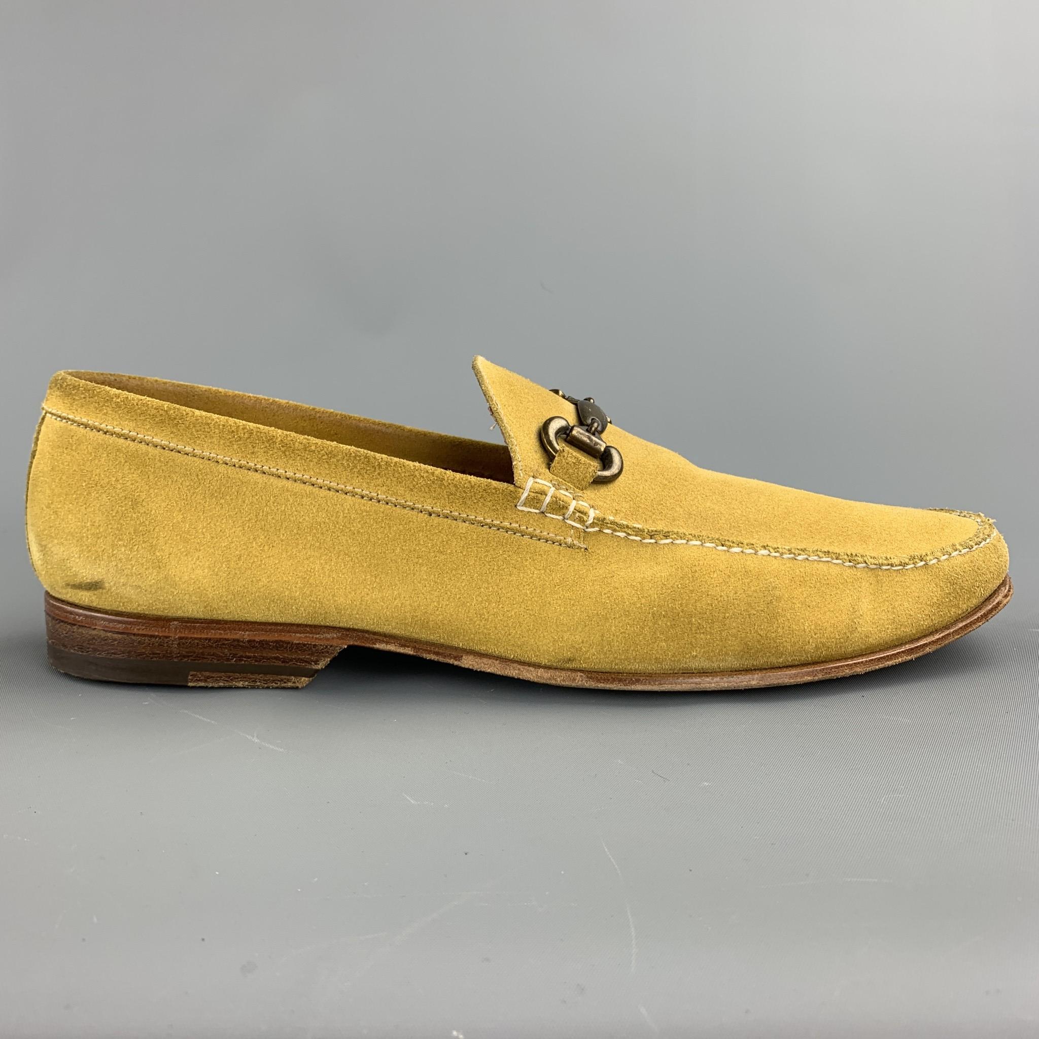 BARRETT loafers comes in a yellow suede featuring a horsebit detail, contrast stitching, and a wooden heel. Minor wear. As-Is. Made in Italy.

Good Pre-Owned Condition.
Marked: 10

Outsole:  

12 in. x 4 in. 