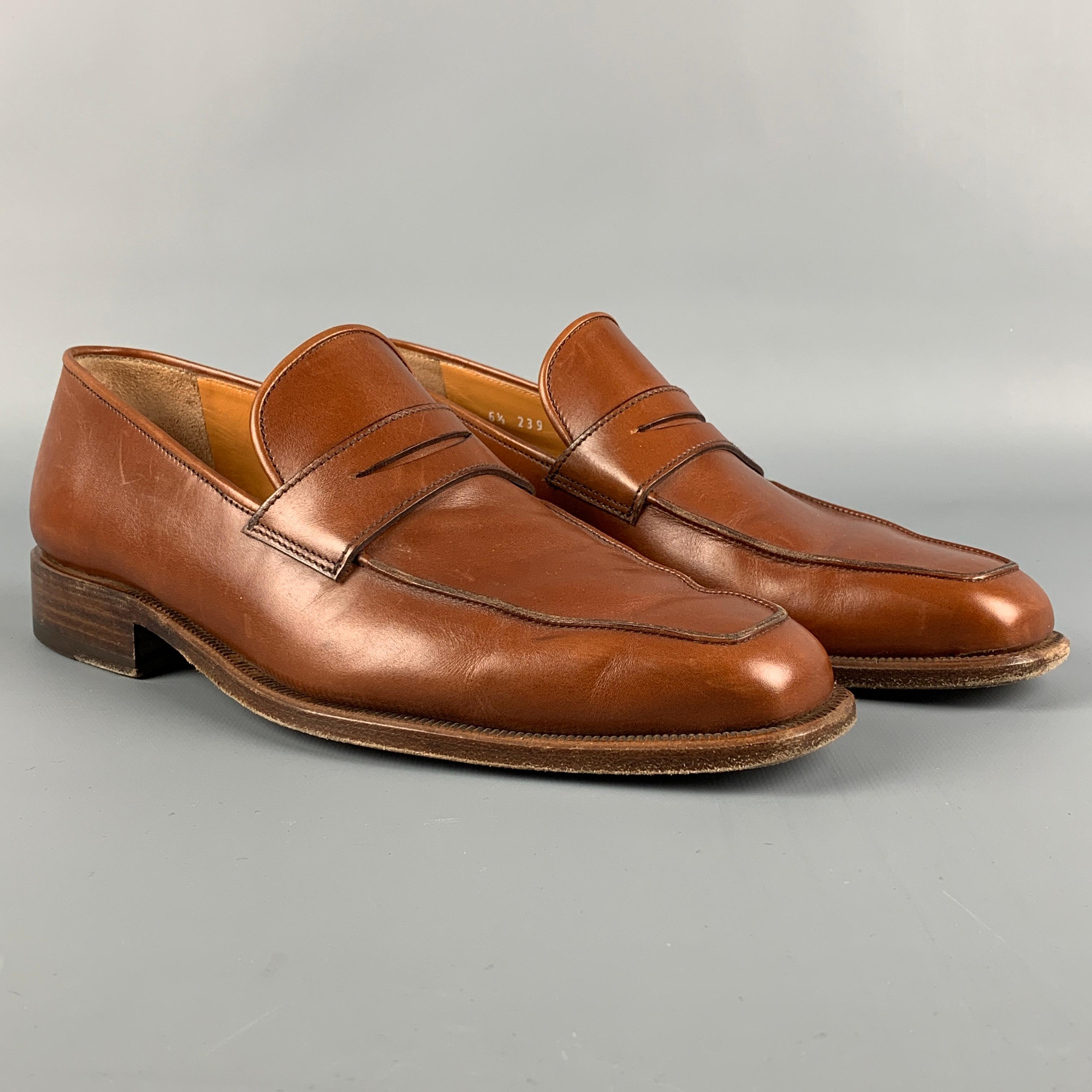 BARRETT x WILKES BASHFORD loafers comes in a tan leather featuring a penny strap, slip on, and a square toe. Made in Italy. 

Very Good Pre-Owned Condition.
Marked: 6.5 239 311033

Outsole: 11 in. x 4 in. 