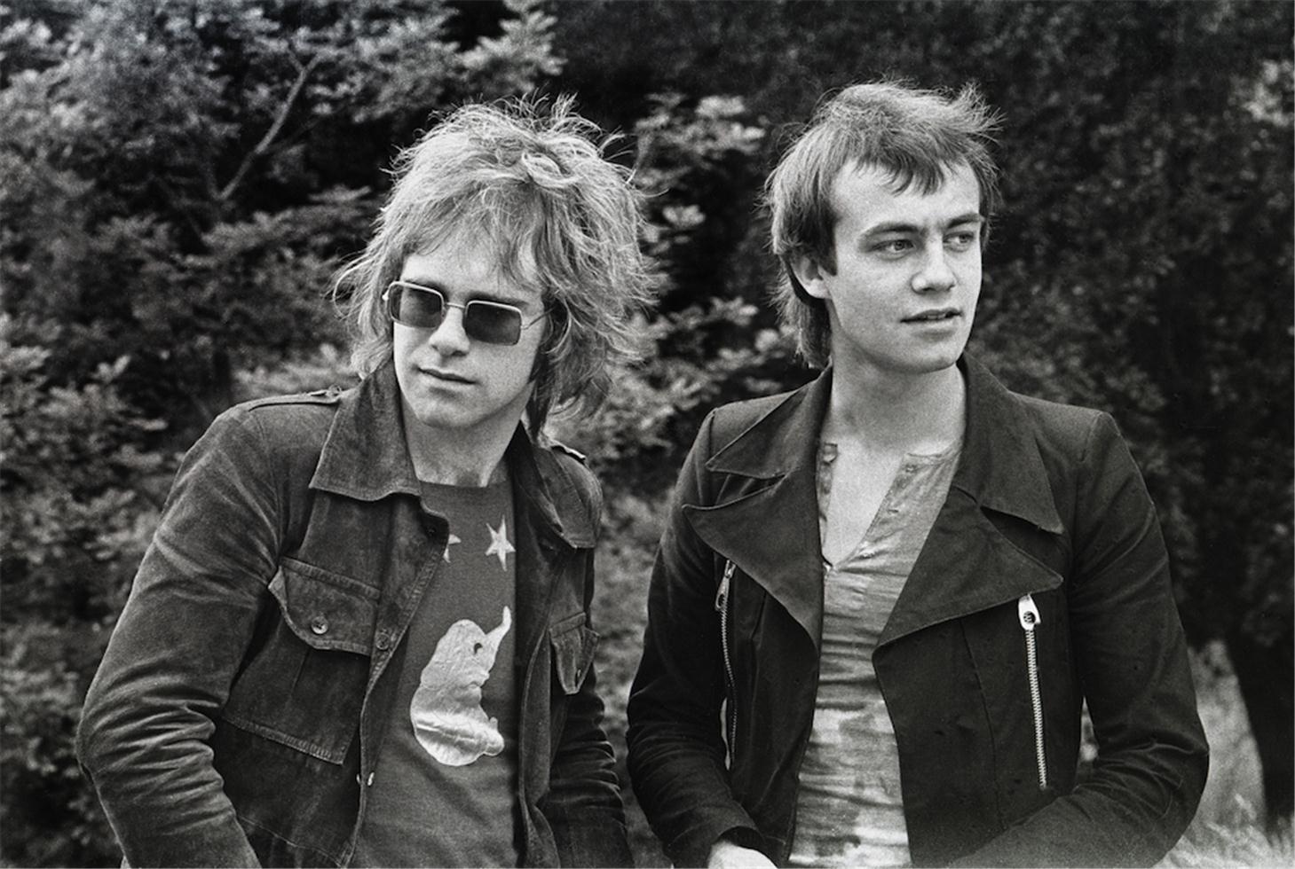 Barrie Wentzell Black and White Photograph - Elton John and Bernie Taupin, Hampstead Heath, London, 1970