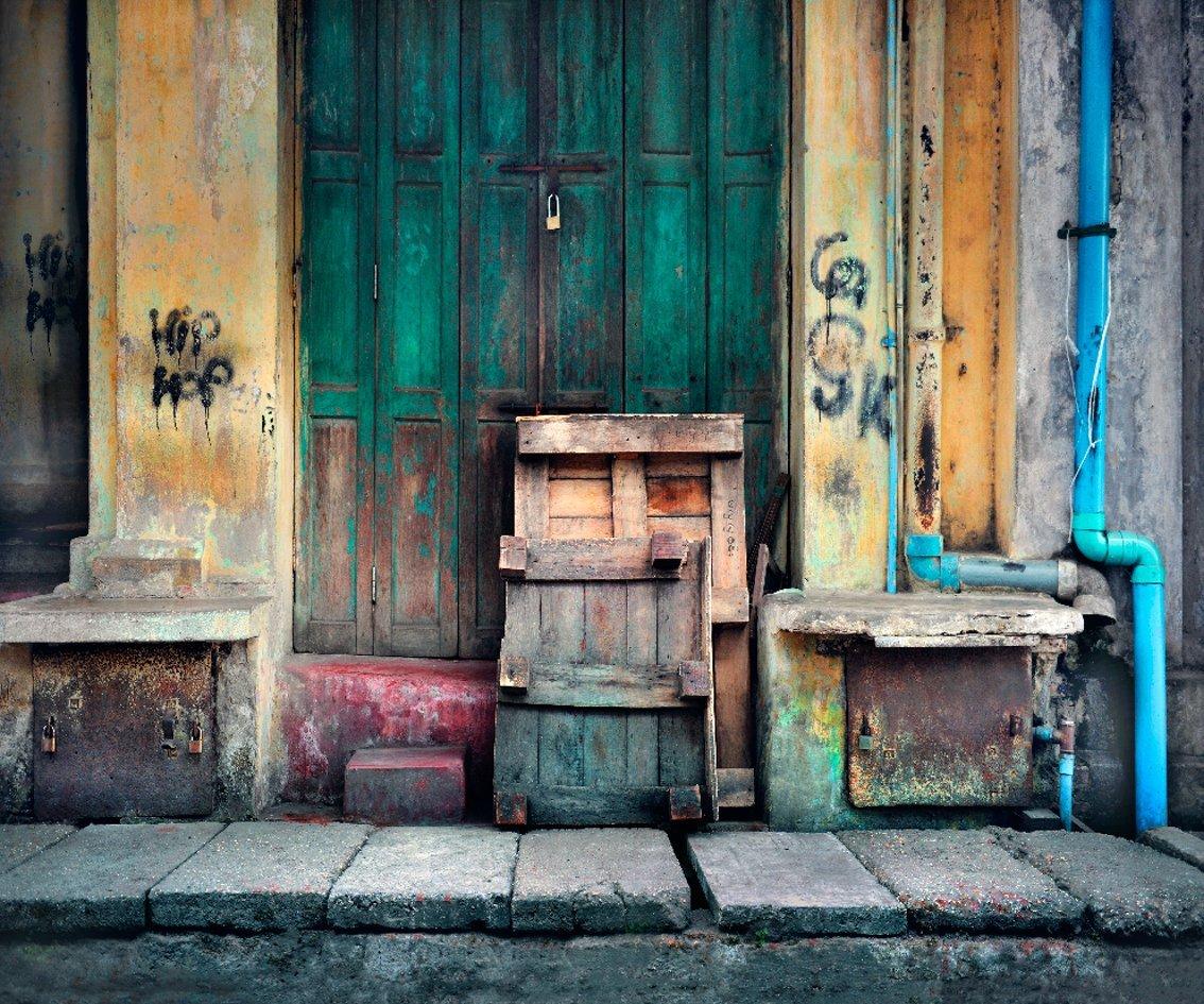 Colours once bright now muted…  their exuberance dimmed but not lost on the streets of Yangon, Burma
–
The Spaces in Between series developed out of visits to Naples in Italy and Havana in Cuba, two cities whose past glories are suffused with a