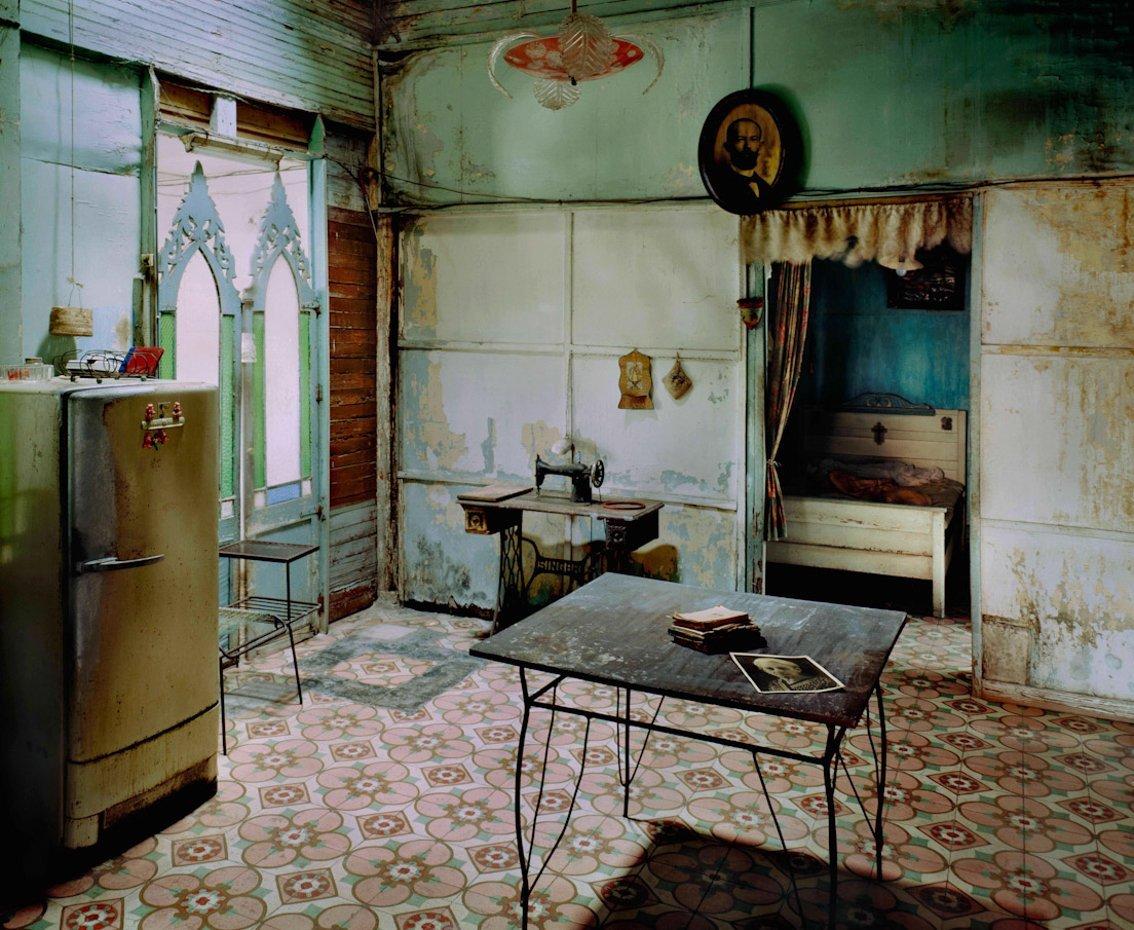 A Soviet-era fridge and an American Singer sewing machine as found in Jorge’s kitchen.
–
The Spaces in Between series developed out of visits to Naples in Italy and Havana in Cuba, two cities whose past glories are suffused with a faded grandeur. 