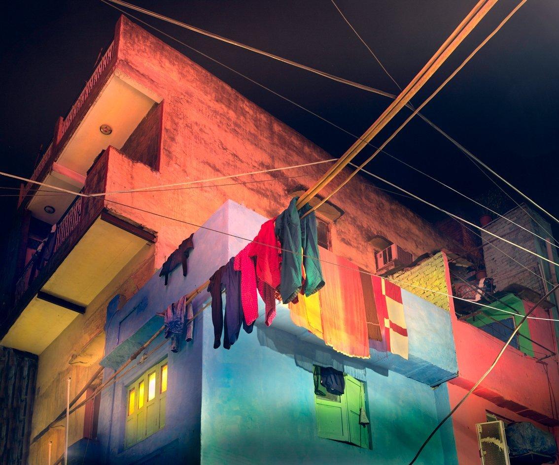 The washing lines and bright colours of a backstreet in New Delhi
–
Cawston won the BJP Nikon Endframe Award in 2009. His prize was funding for a dream project and he chose to travel the length of the Yangtze river from the Tibetan plateau to the