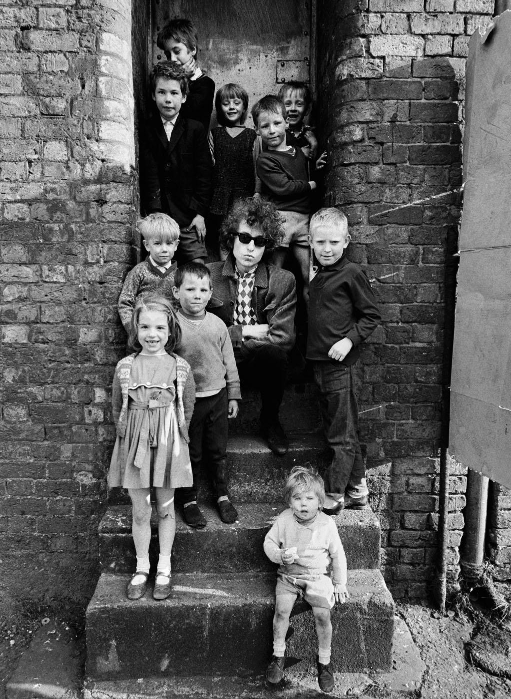 Barry Feinstein Black and White Photograph - Bob Dylan, "Kids On Steps" Liverpool, England 1966, framed 20x24" print