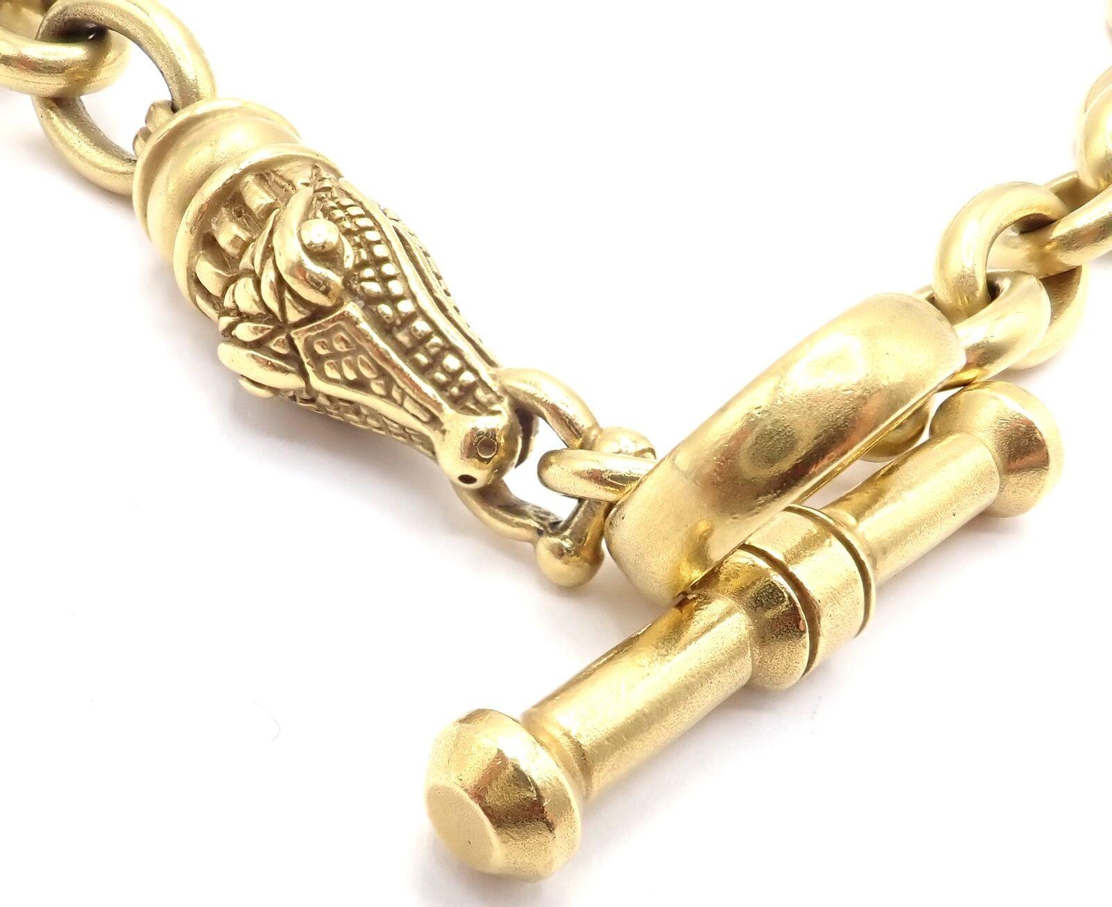 18k Yellow Gold Alligator Head Link Toggle Necklace by Barry Kieselstein Cord.
Details:
Measurements: Alligator head 31mm x 10mm
Toggle 36mm x 7mm
Weight: 200.4 grams
Length: 18
