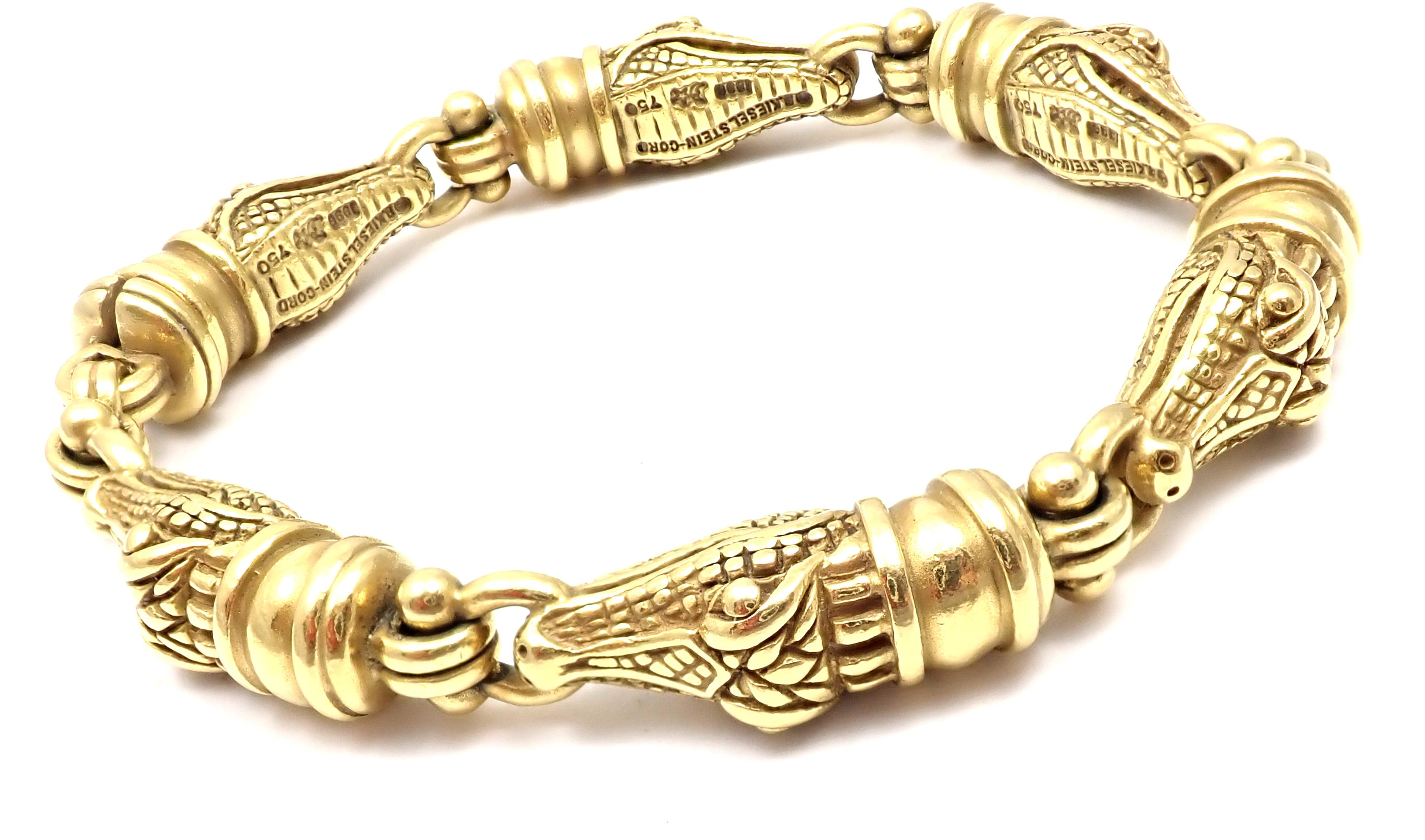 18k Yellow Gold Alligator Heads Link Bracelet by Barry Kieselstein Cord.
Details: 
Weight: 72.5 grams
Length: 7.5