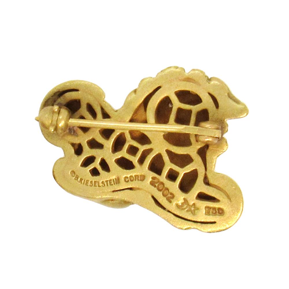 18K gold Foo dog pin, one of a pair, by Barry Kieselstein-Cord dated 2002.  Each brooch measures 7/8