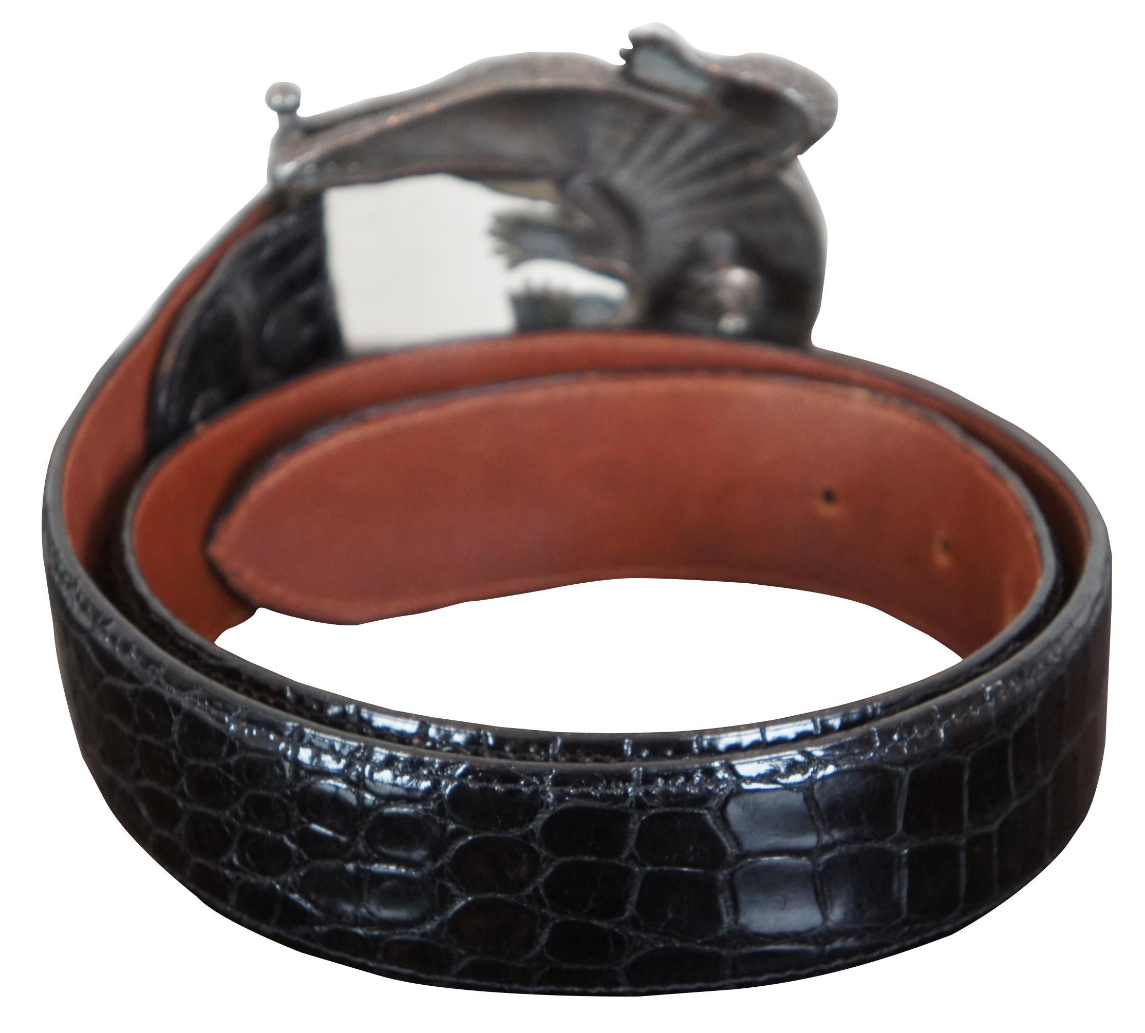 Vintage Barry Kieselstein-Cord sterling silver alligator belt buckle and brown crocodile skin belt.

Belt - 26.5” to 30.5” x 1.5” / Buckle - 3.5” x 3.5” x 0.5”/ 167 g (Length x Width x Depth/Weight)