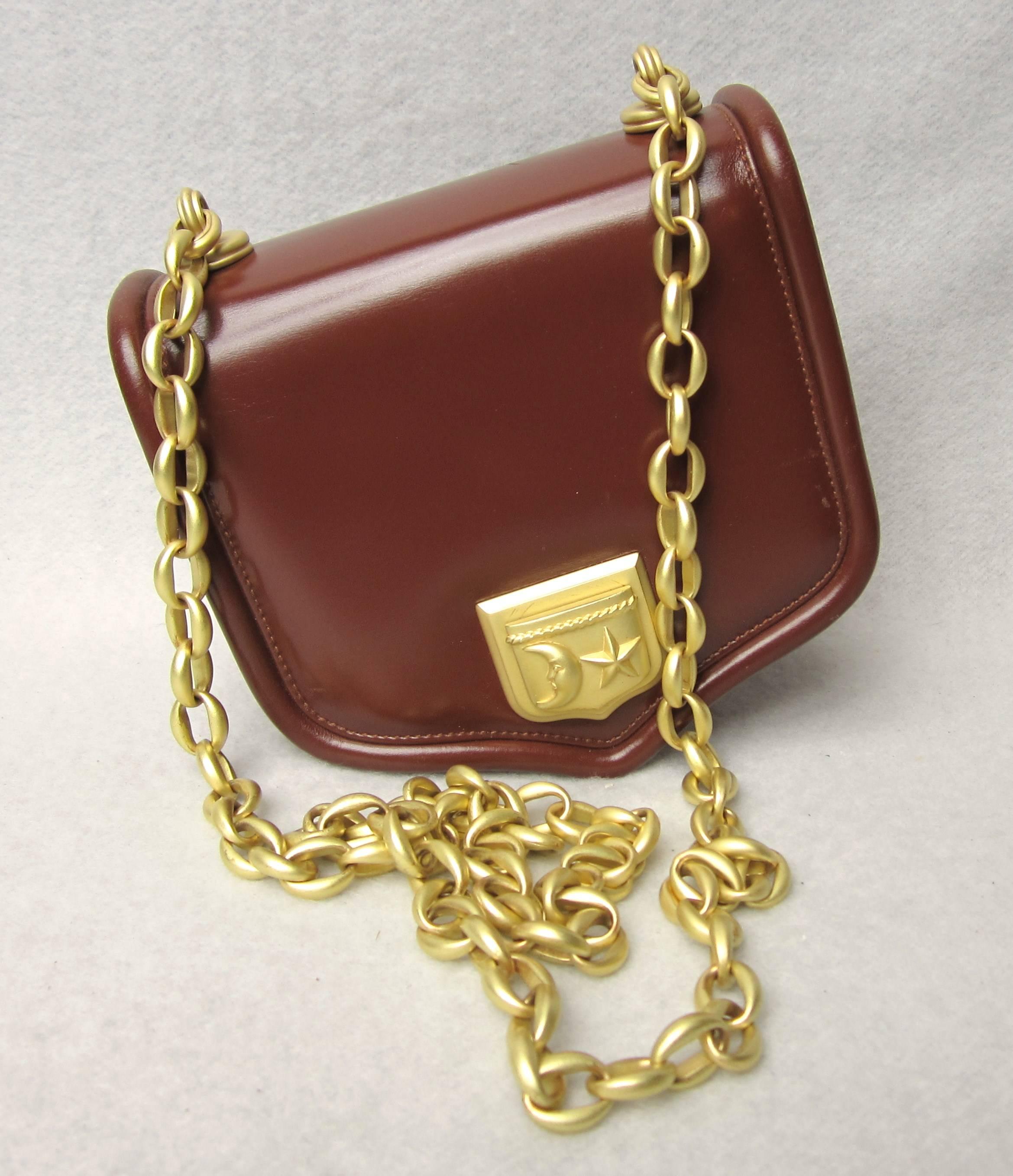Long Gold Brushed Chain link on this Kieselstein Handbag. This was Purchased new back in the early 1990s and never worn. Zipper compartment Measuring 6.25 wide x 5.5 high x 3 deep with a 21 in. long chain. Dust bag included. This is out of a massive