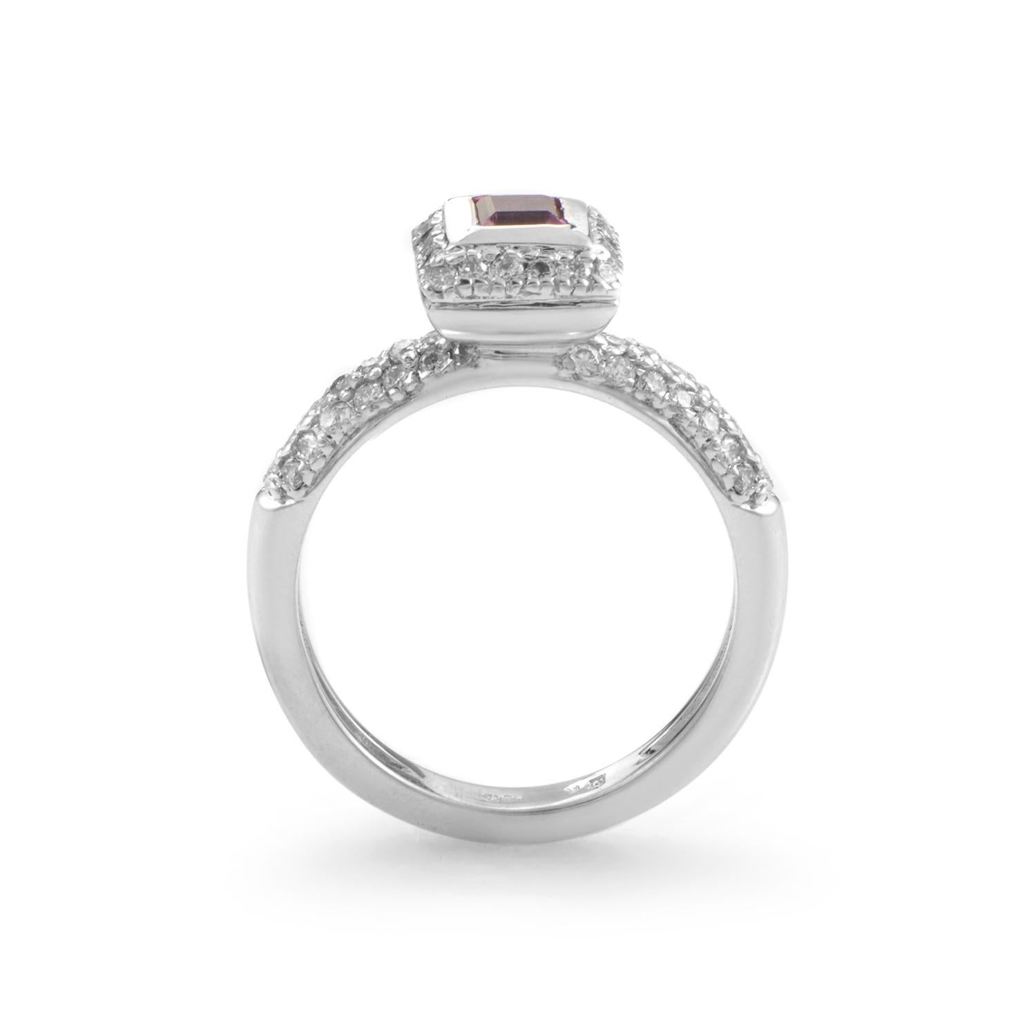 This luxurious Barry Kronen ring possesses stylish glamorous appeal that is both fashionable and extravagant; the ring is made of finest 18K white gold lavishly set with 0.65ct of splendid diamonds, while the center-spot is reserved for a majestic