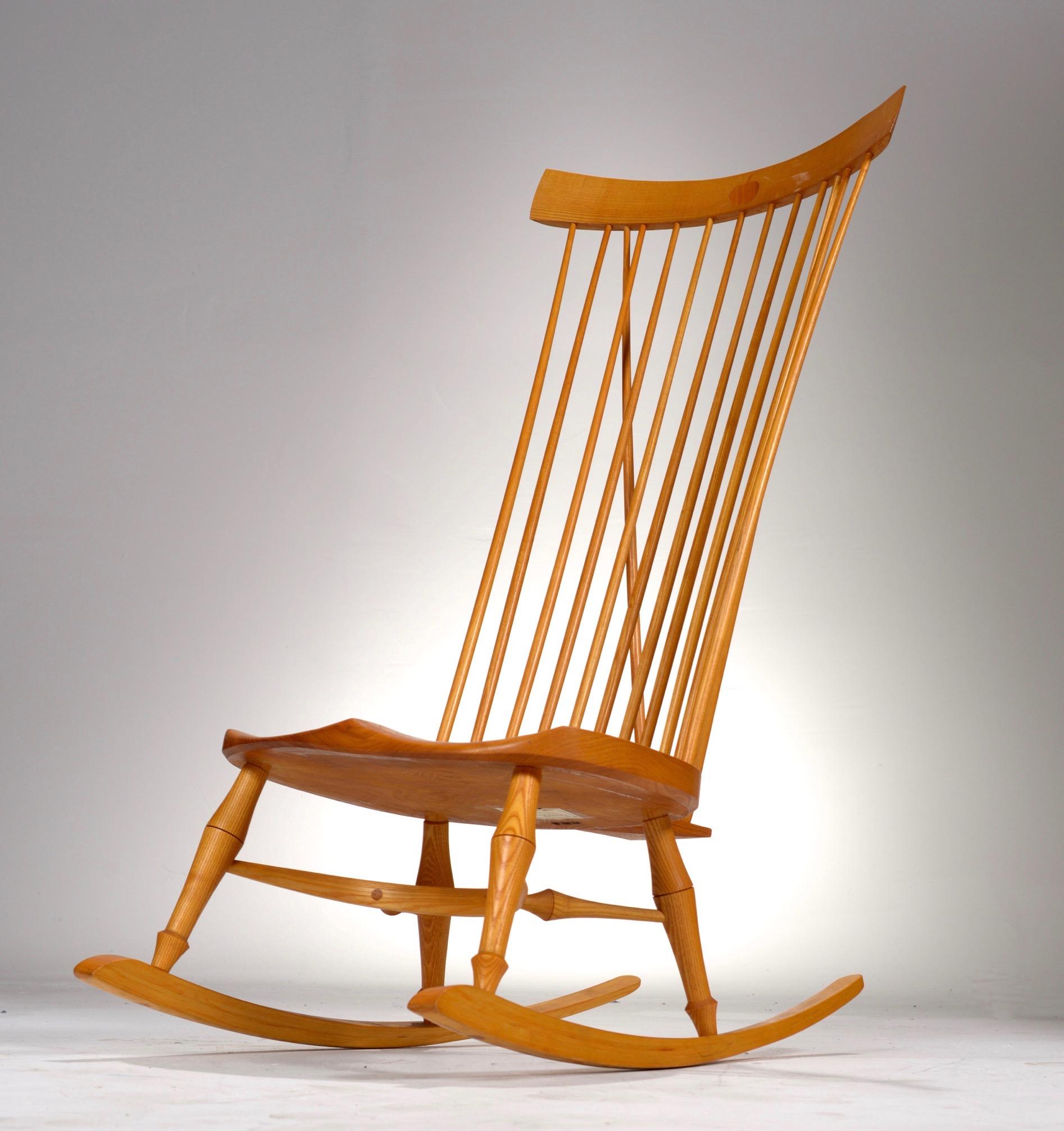 Comfortable and lightweight rocker in ash and elm with v-back support and inlayed apple detail. Made in the 1980s by Barry Michael Murphy out of Windmill Hill in East Sussex, England.

This amazing rocker is viewable at our Los Angeles Arts District