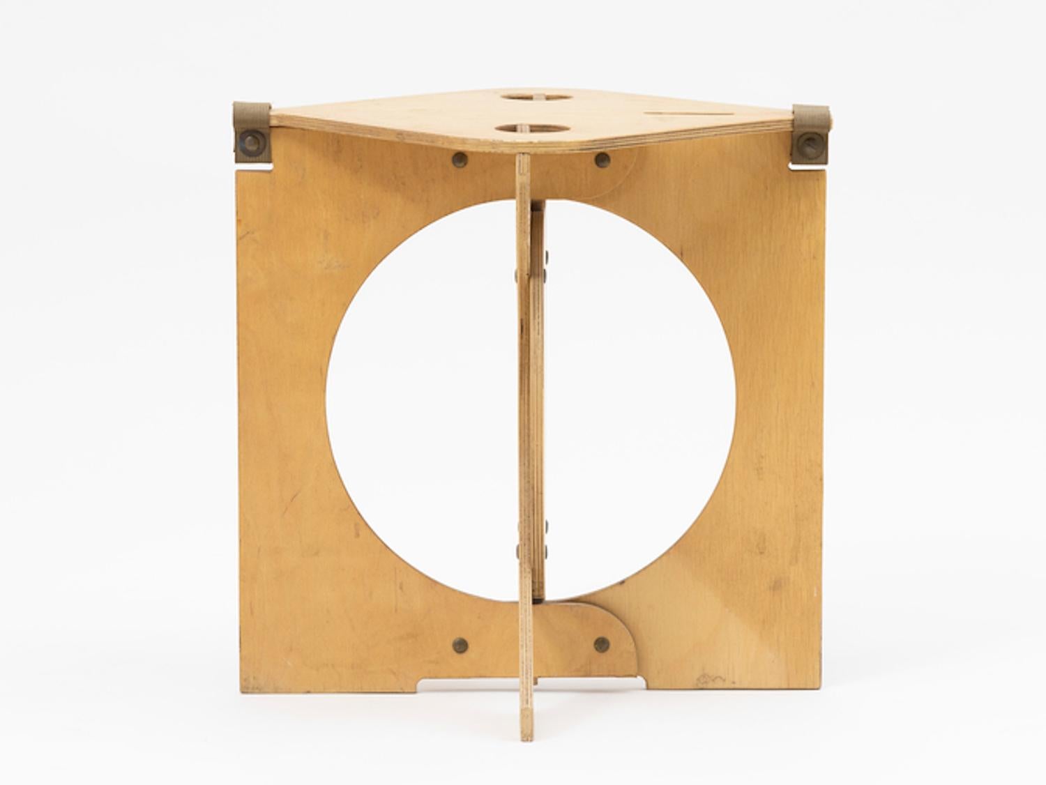 Plywood and canvas folding stool by Barry Simpson, manufactured by Dirt Road in Waitsfield, Vermont between 1976-1984. Marked on underside of seat: Rooster by Dirt Road / Waitsfield, VT. This design is in the permanent collection of the Brooklyn