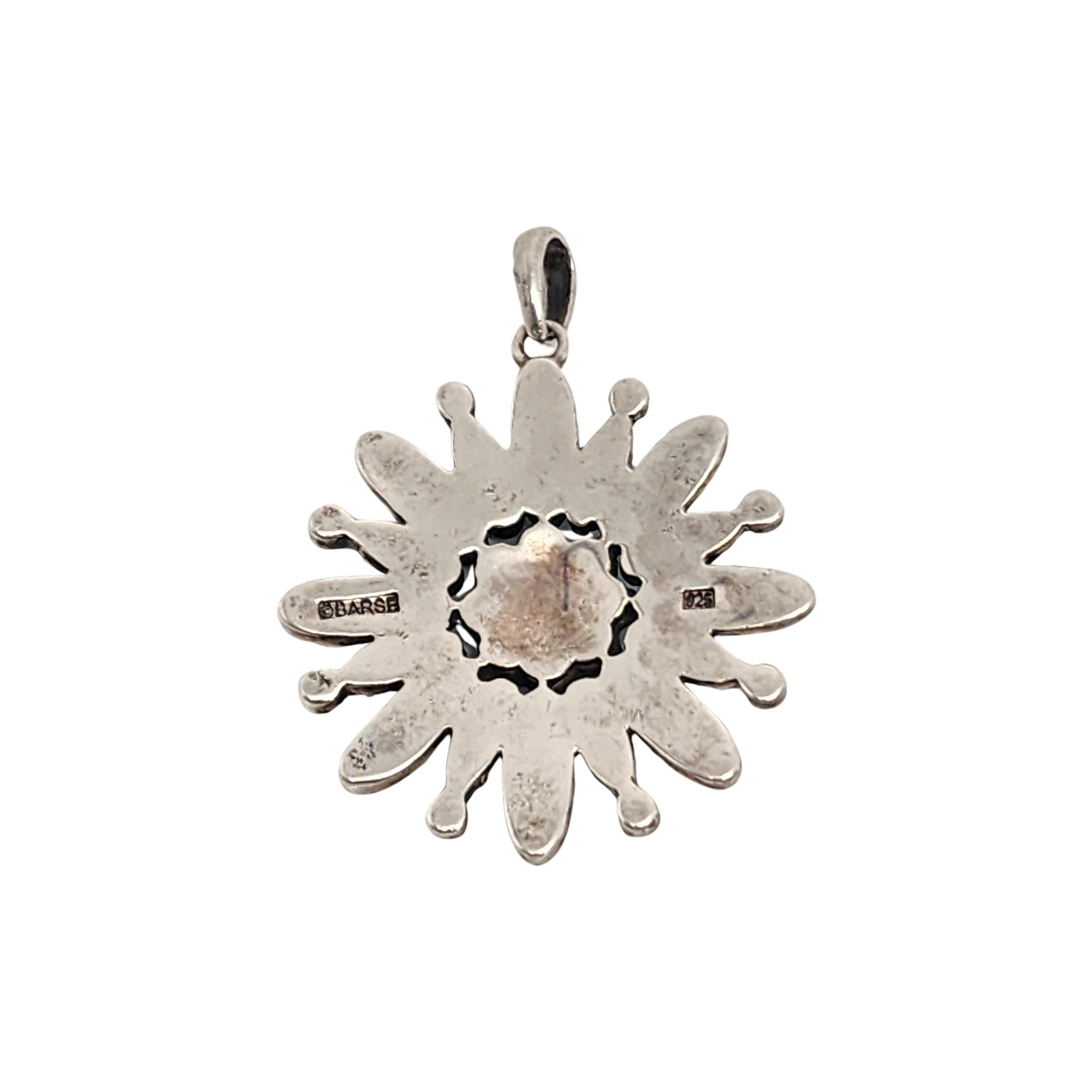 Barse sterling silver turquoise flower pendant

This flower shaped pendant features oval bezel set turquoise petals accented with light blue gemstones.

Weighs approx 18.8g, 12.1dwt

Measures approx 2