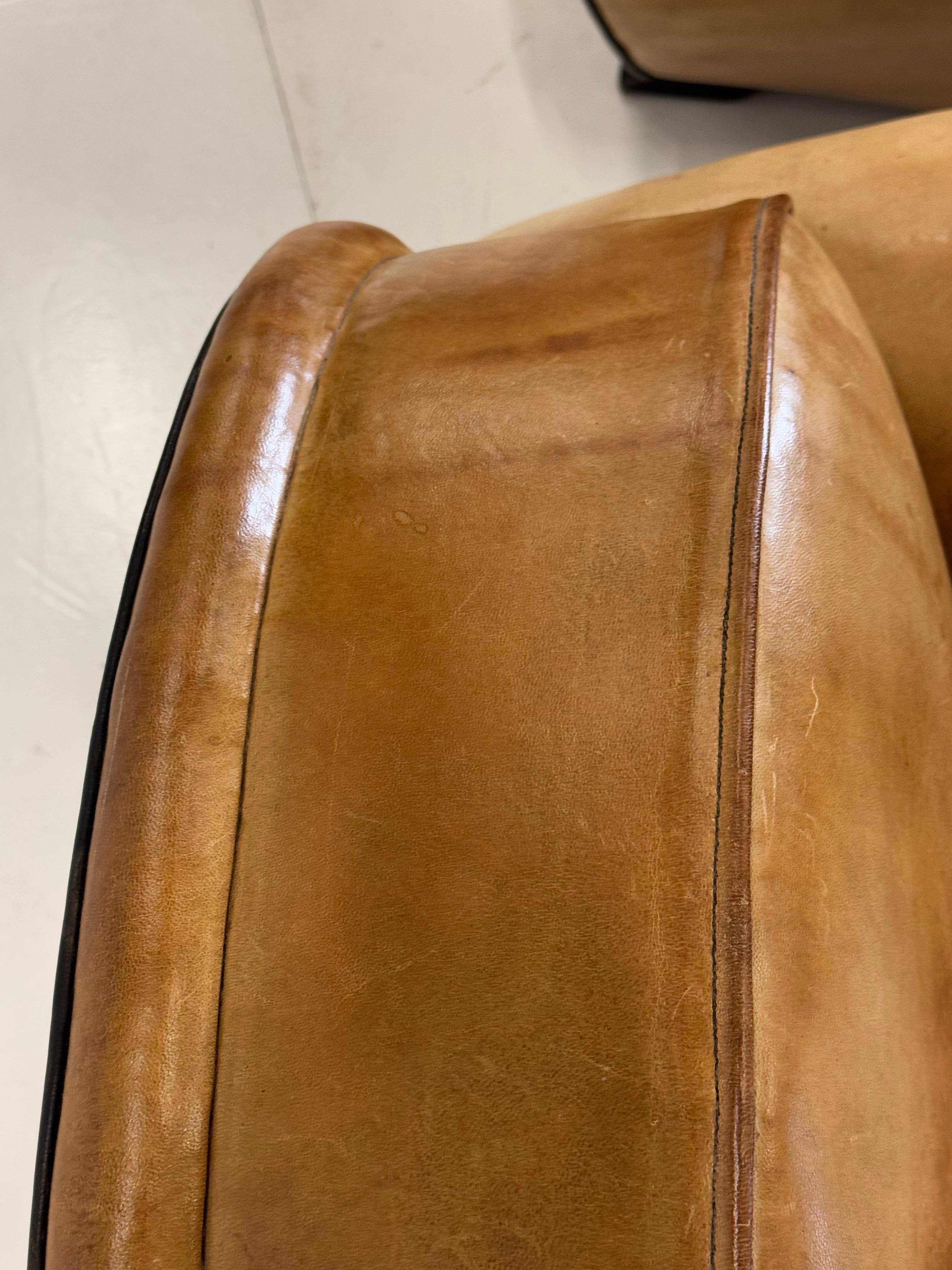 Sheepskin leather Bart van Bekhoven club chair. Light brown in colour. Made of the highest quality type of sheep leather from Australia. Art Deco style. Large size.

Dimensions: 95W x 99D x 86H
Sh: 47cm