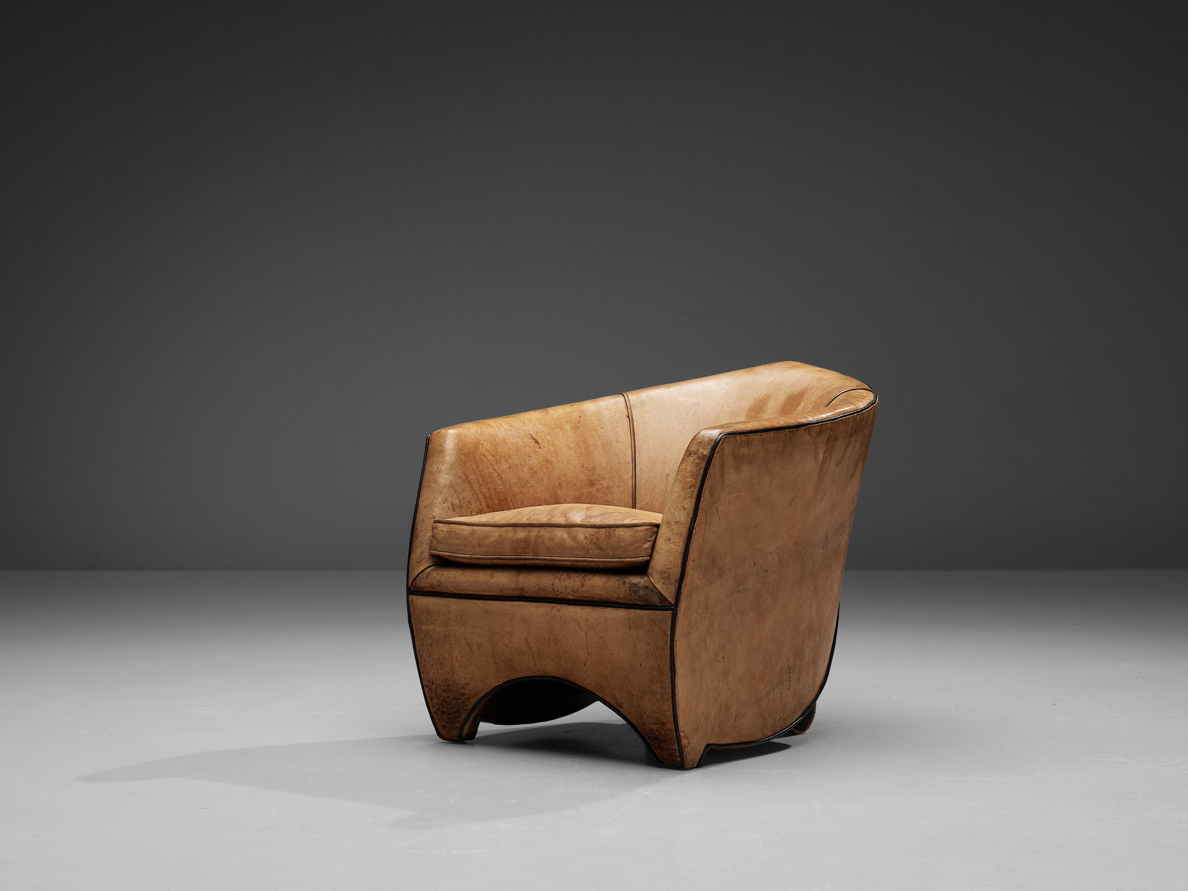 Bart van Bekhoven, 'cocoon' lounge chair, leather, The Netherlands, 1990s

Beautiful 'cocoon' lounge chair created by Dutch designer Bart van Bekhoven. A wide and comfortable chair in a cognac leather upholstery. Truly extraordinary design that has
