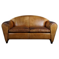 Used Bart van Bekhoven sheepleather 2-seater design sofa, beautiful light honey color