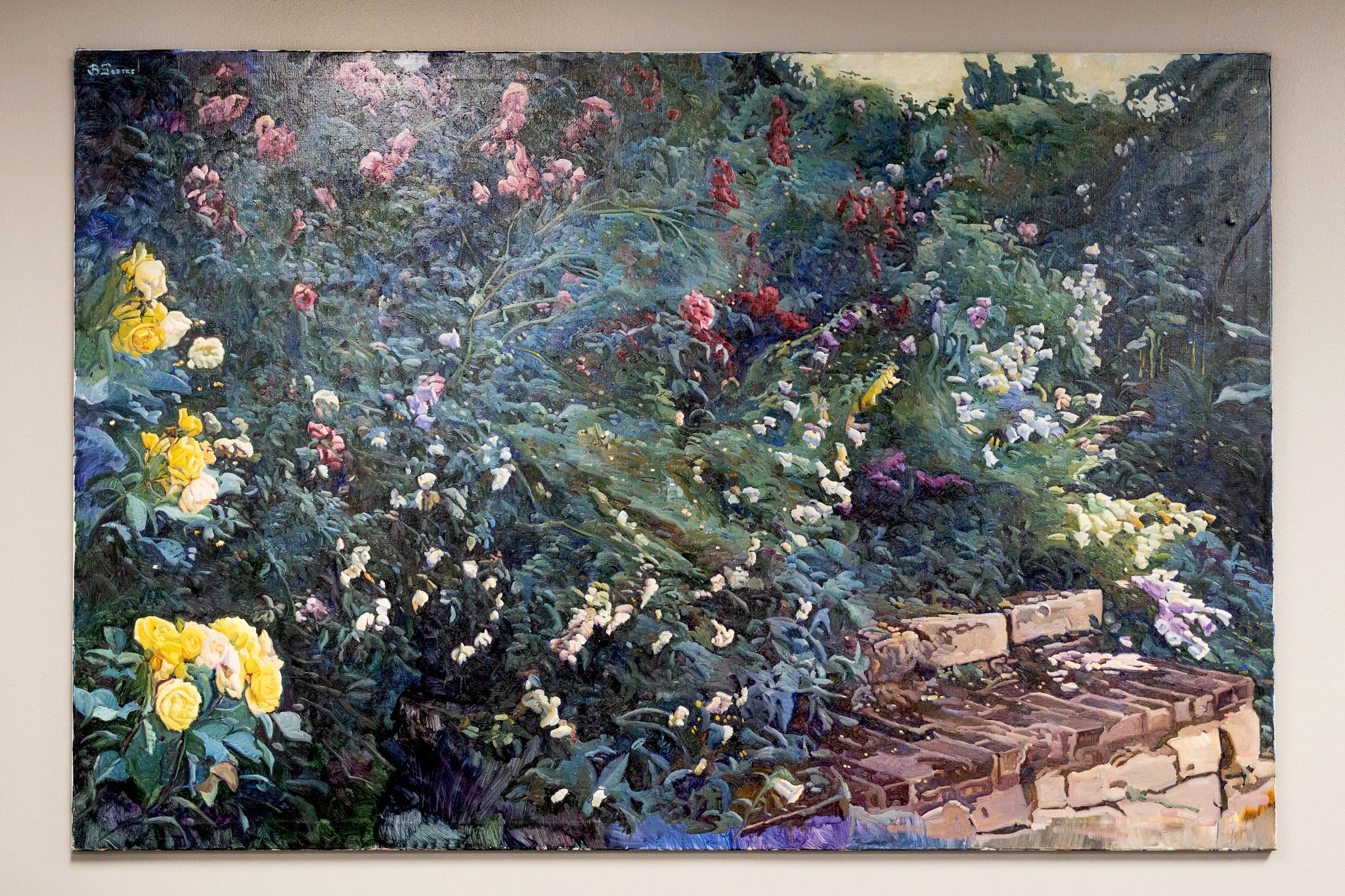 By Bartolome Sastre
This vast and stunning floral scene depicts a wall of flowering plants with pink, purple, red, and yellow petals. The impressionist style gives the flowerbed a sense of movement, almost like a waterfall. Brown stone steps peak