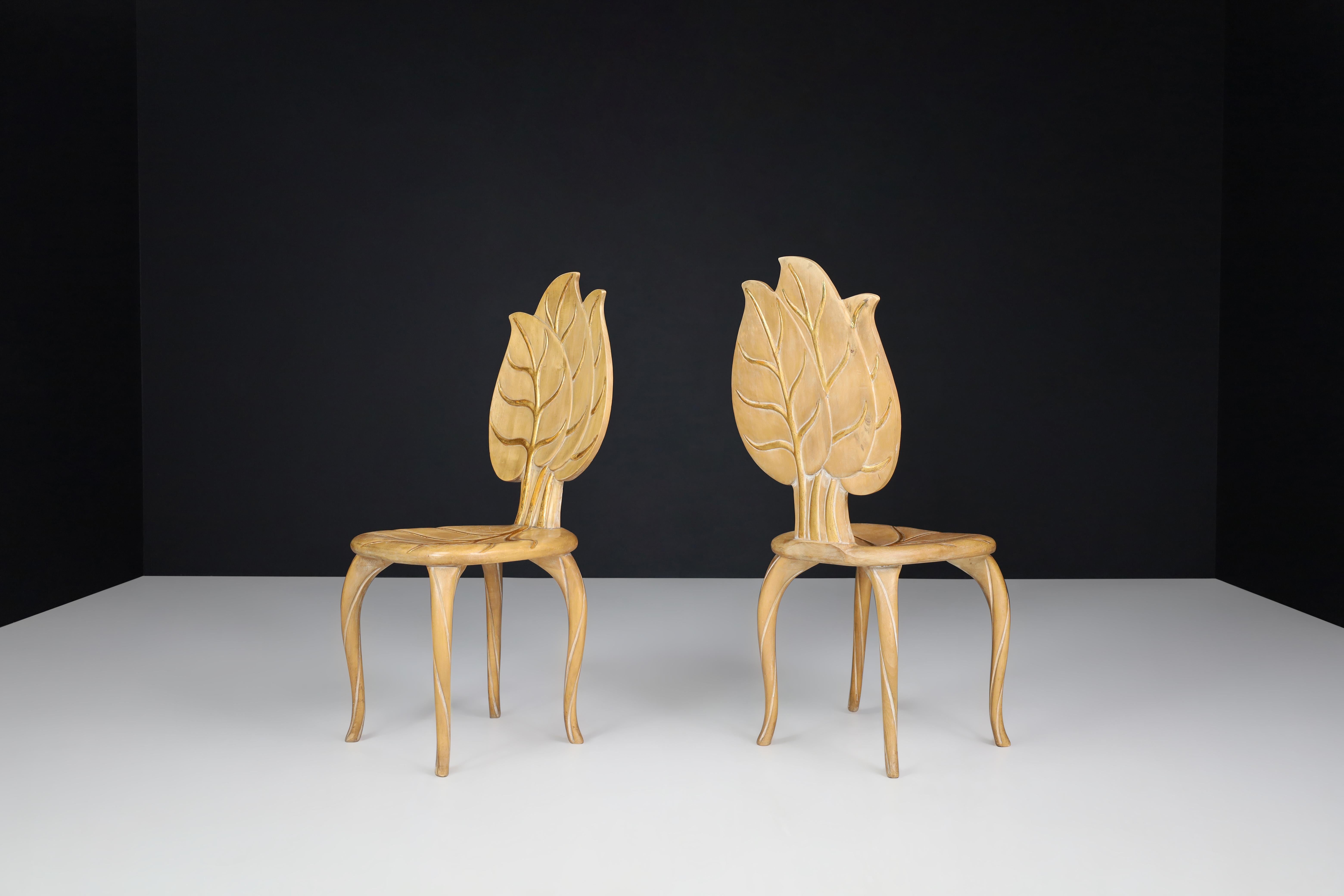 Bartolozzi & Maioli wooden and gold leaf chairs, Italy, 1970s.

Pair of two Bartolozzi & Maioli hand carved wooden leaf chairs with original patina. These chairs would make an eye-catching addition to any interior, such as a living room, family