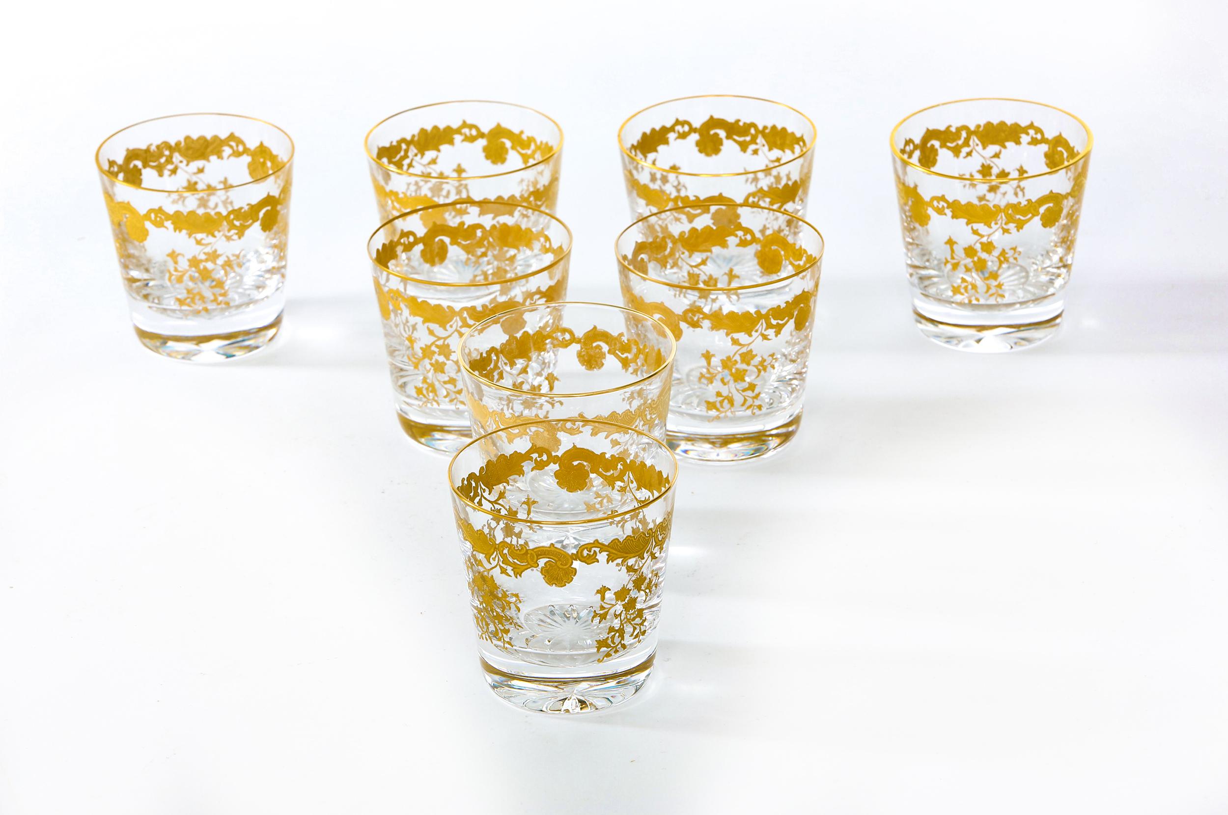 Mid-20th century Saint Louis crystal with gold design details tableware or barware whiskey or scotch service for eight people. Each one is in great condition. Maker's mark stamped undersigned. Each one stands about 3.5 inches tall x 3.4 inches