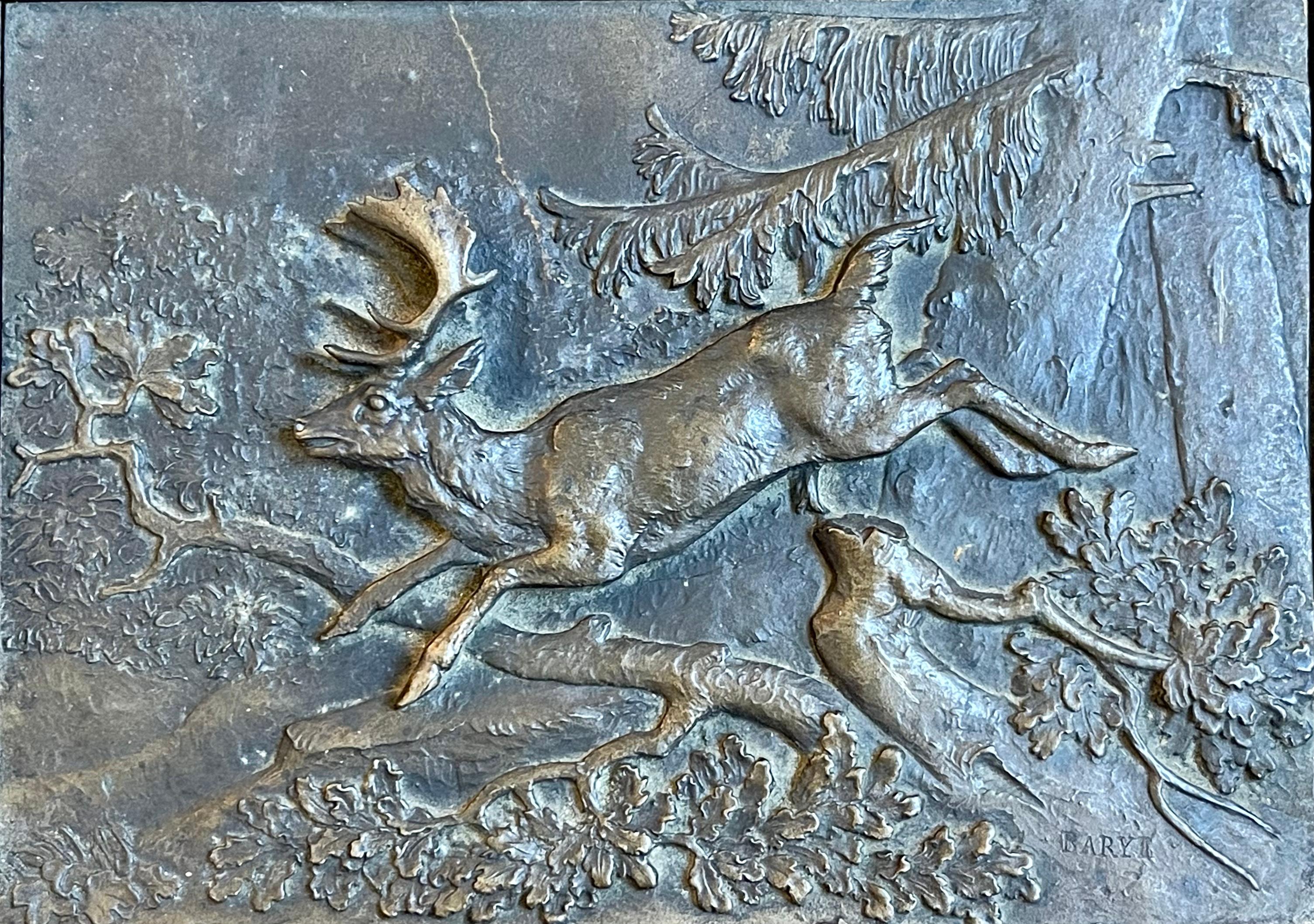 Bronze bas relief representing a white-tailed deer running in the forest signed 