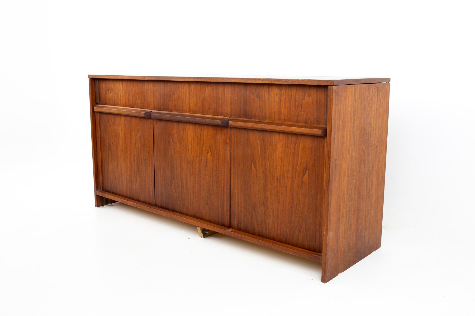 Barzilay mid century stereo console
Console measures: 58.5 wide x 19 deep x 29.25 inches high 

All pieces of furniture can be had in what we call restored vintage condition. That means the piece is restored upon purchase so it’s free of