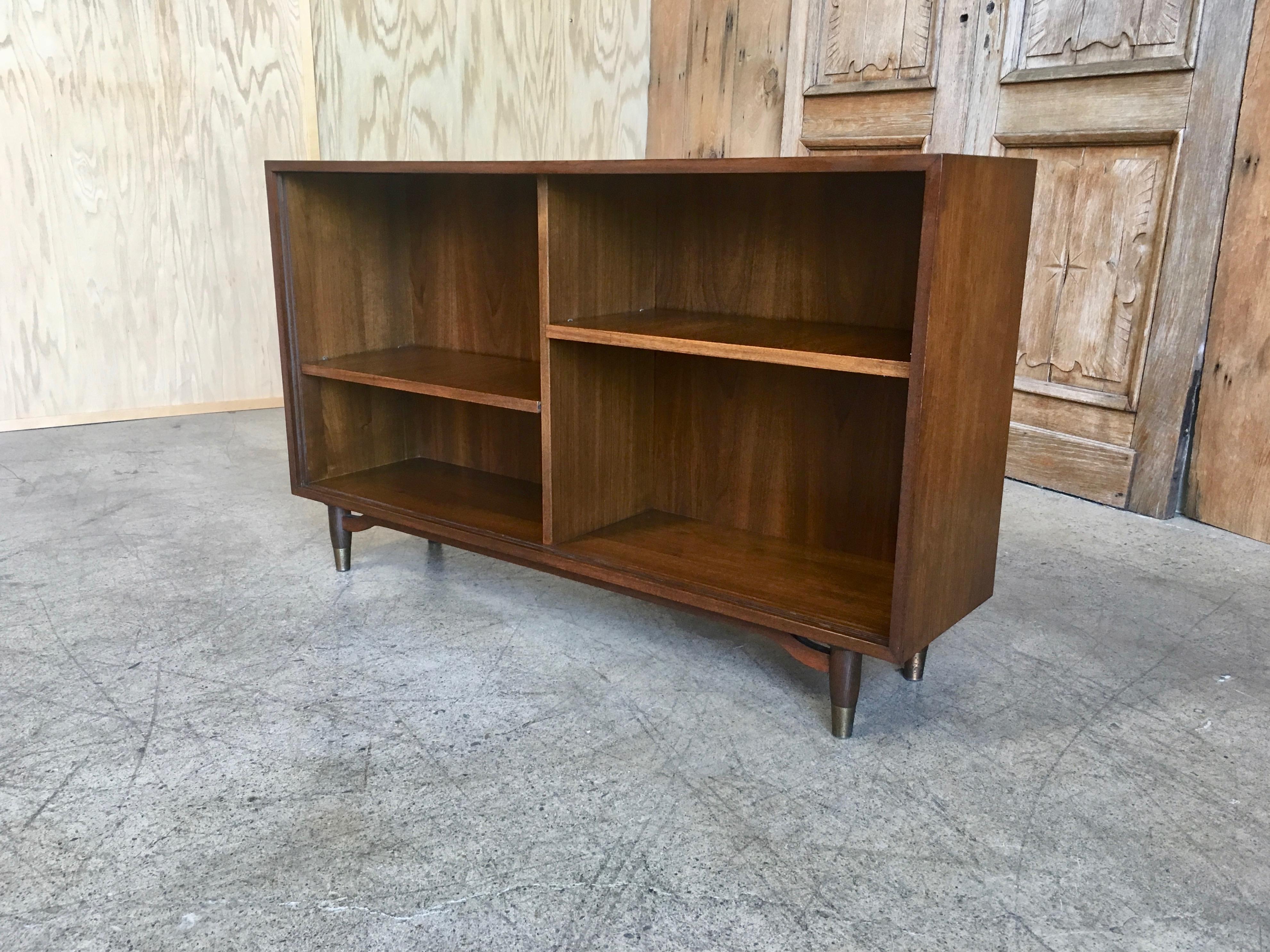 Rare Barzilay bookcase or China cabinet with sliding glass doors.
