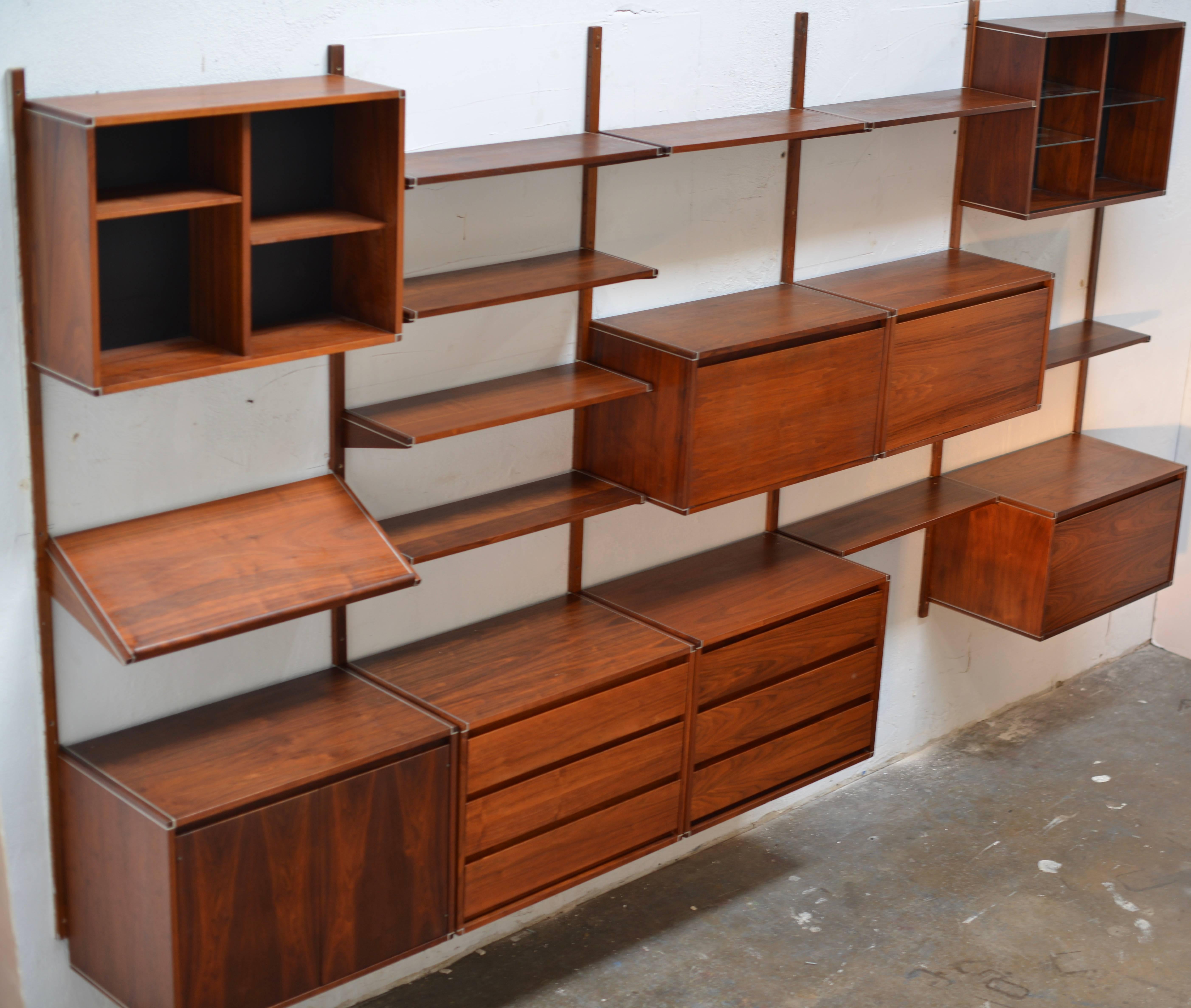 This is an amazing five bay wall unit by Barzilay of Los Angeles. We have a variety of cabinet, shelves, and desk components and can customize your order.
 